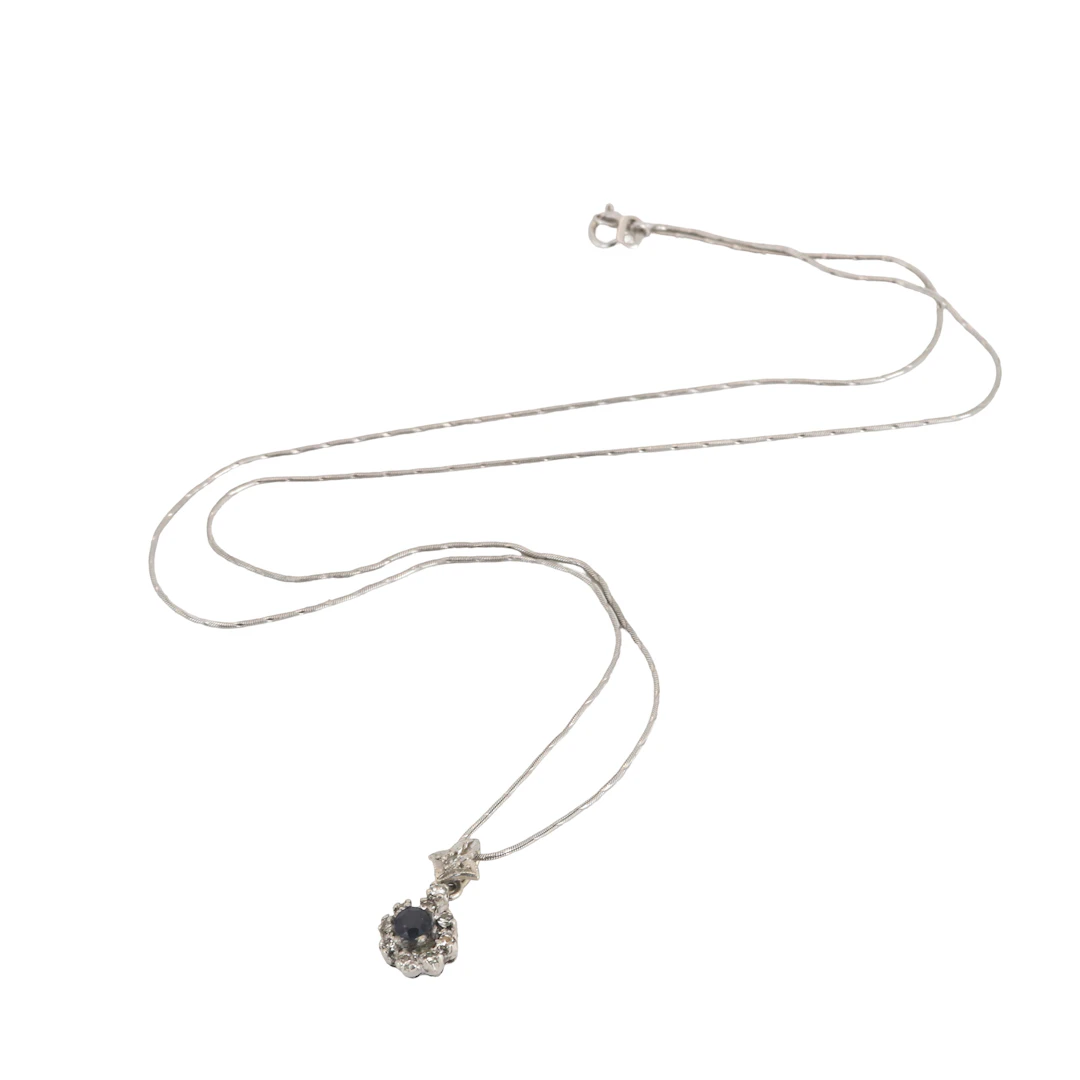 WHITE GOLD SAPPHIRE AND DIAMOND PENDANT AND CHAIN.