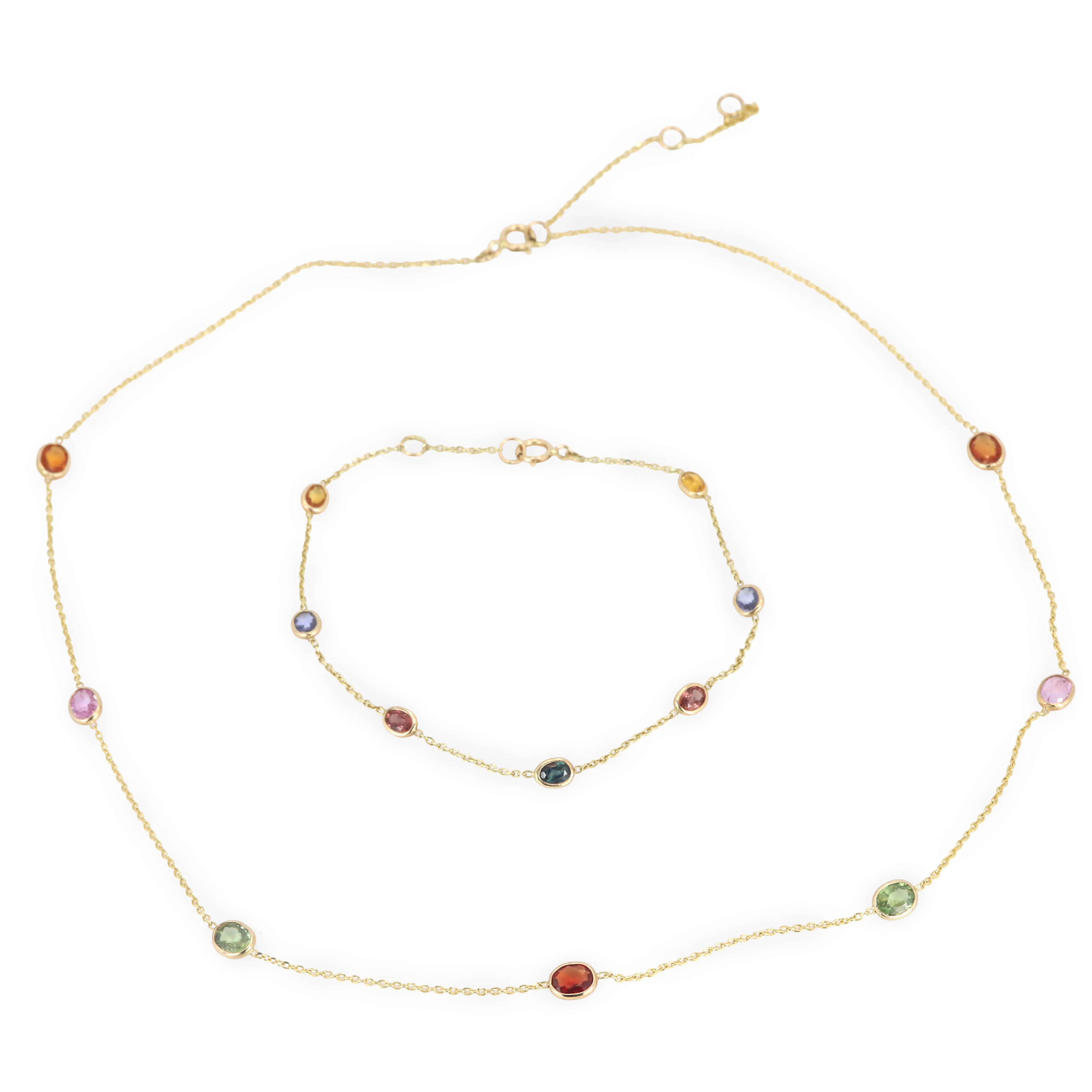 14CT GOLD SAPPHIRE JEWELLERY SET.