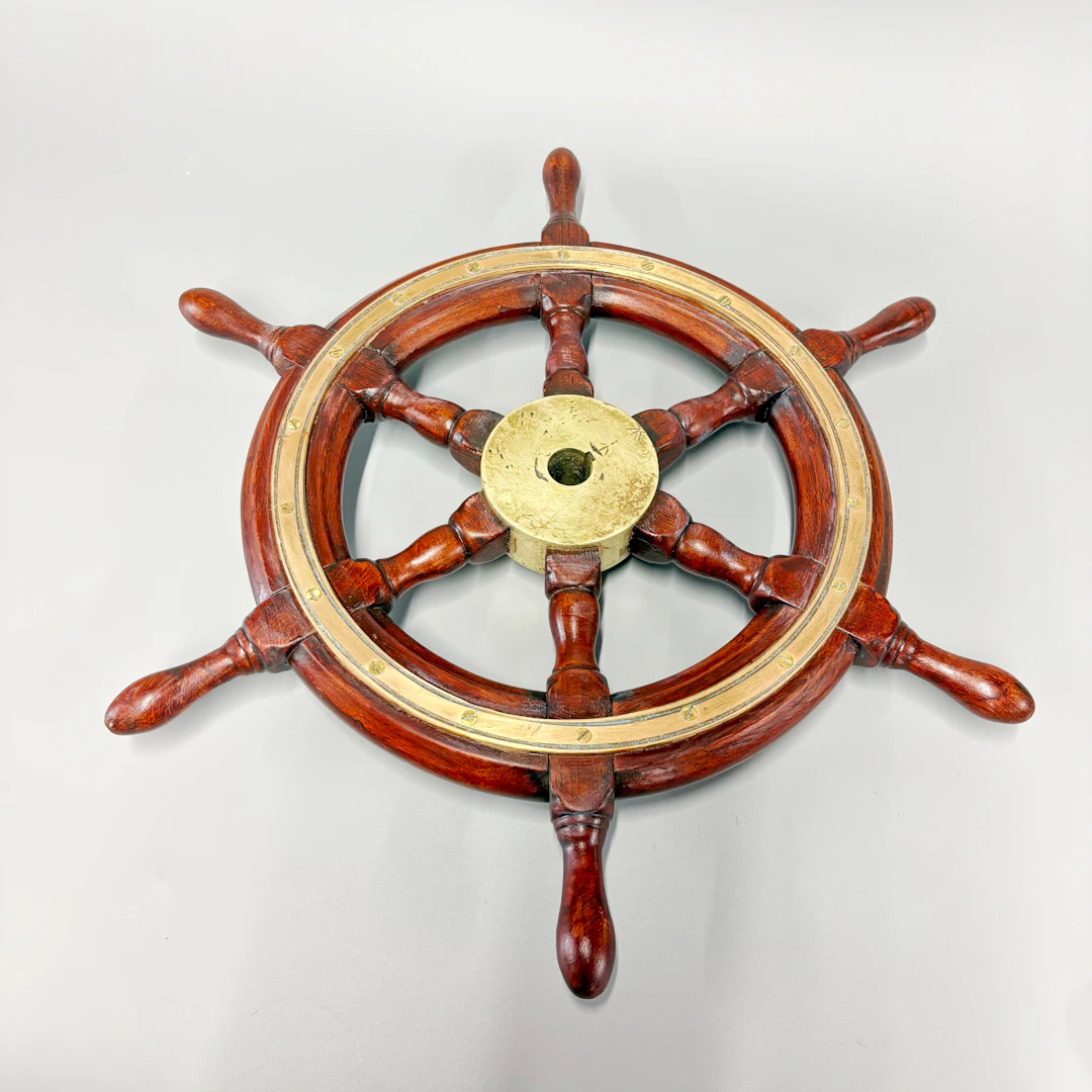BRASS MOUNTED SHIP'S WHEEL.