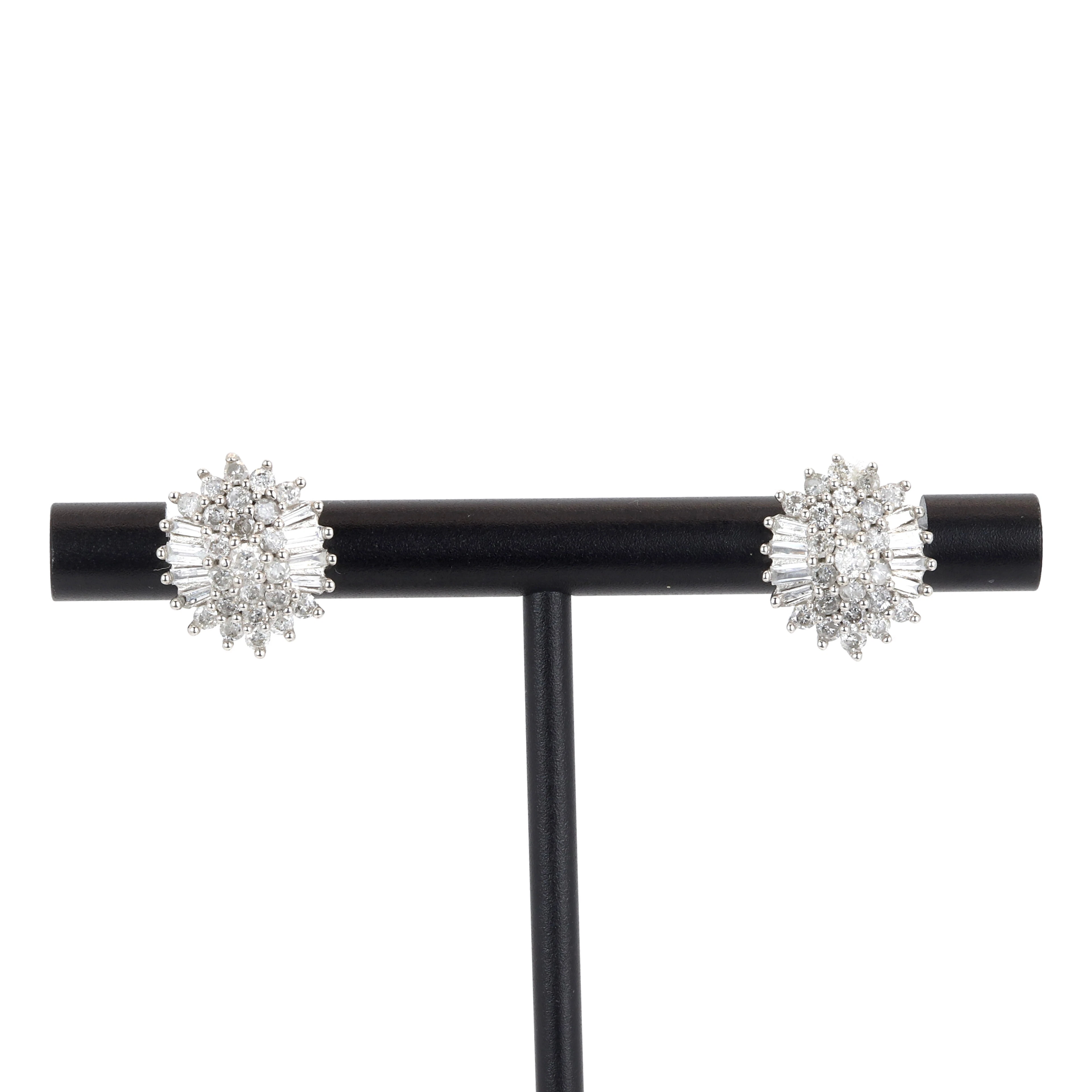 9CT GOLD DIAMOND EARRINGS.