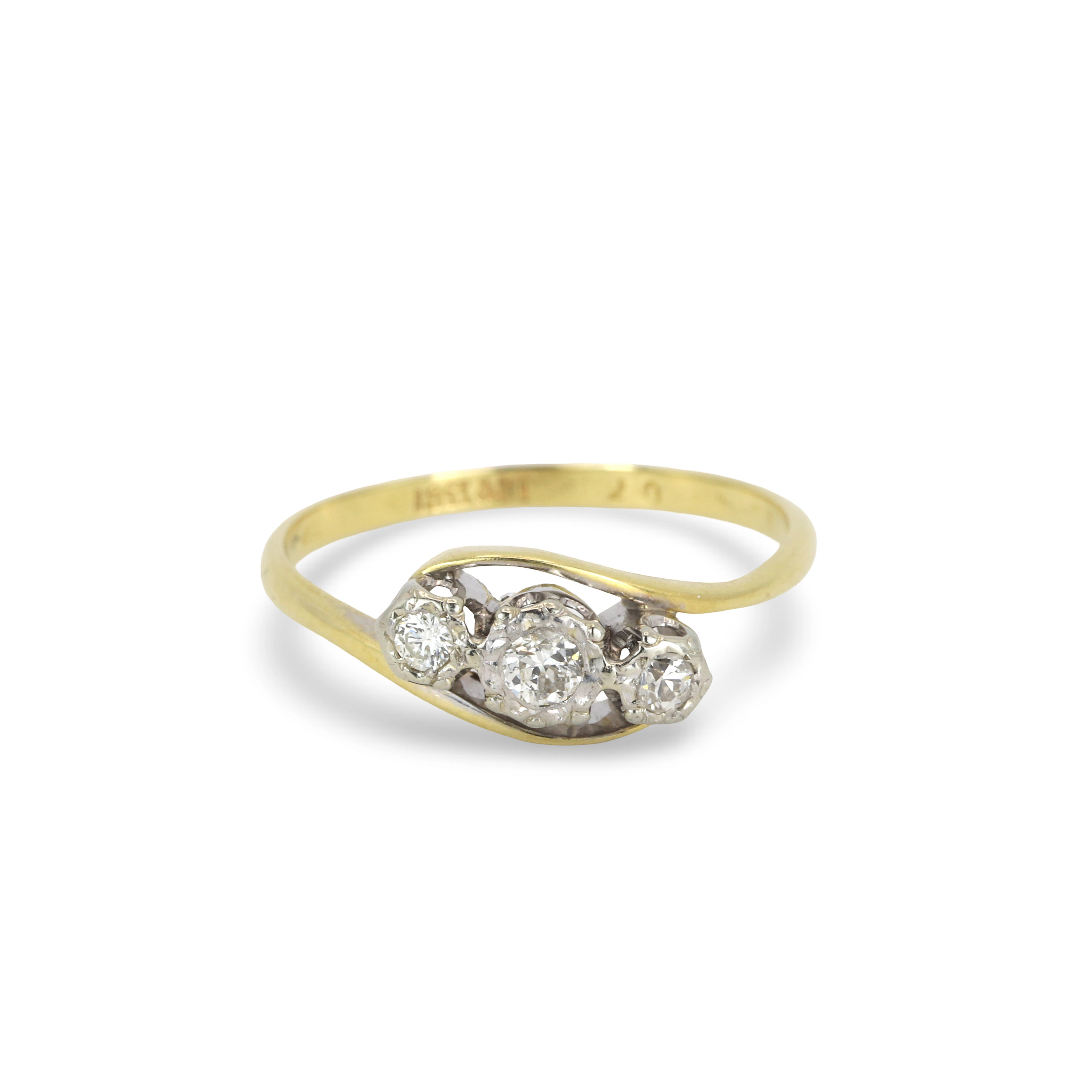 18CT GOLD DIMOND RING.