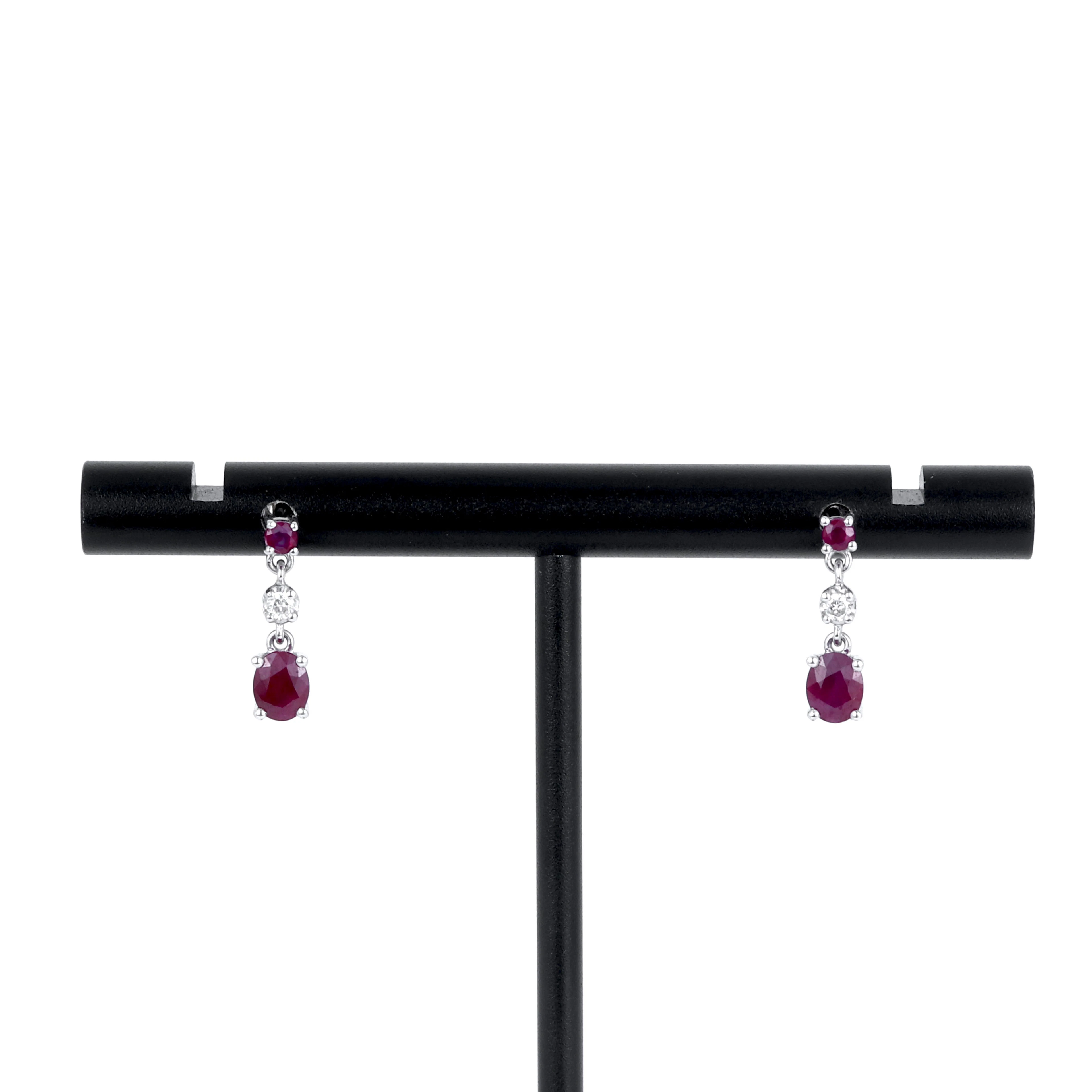 18CT RUBY AND DIAMOND EARRINGS.