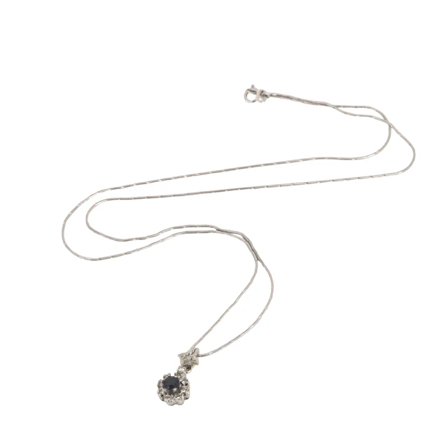 WHITE GOLD SAPPHIRE AND DIAMOND PENDANT AND CHAIN.