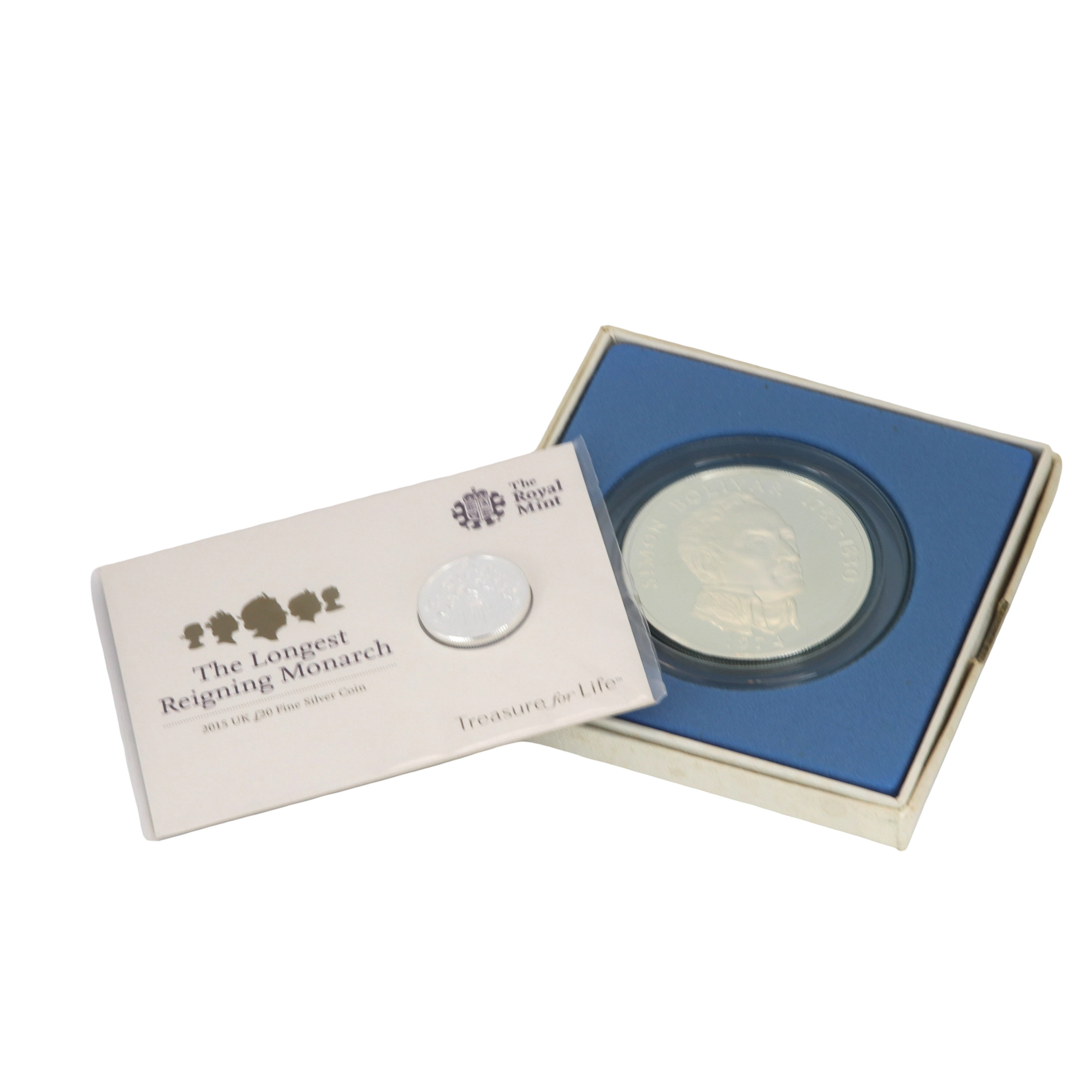 20 BALBOAS SILVER COIN WITH 2 £20 COINS.