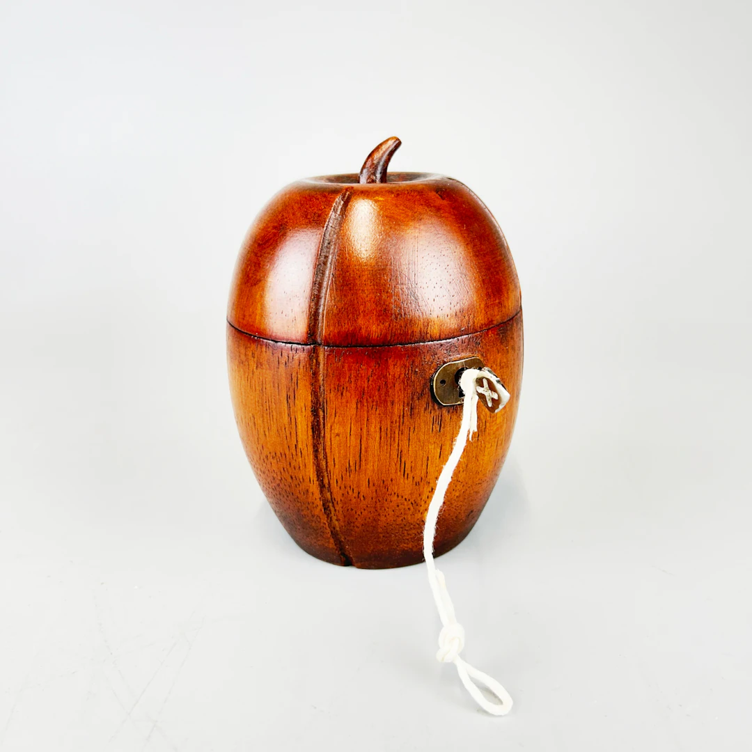 MELON SHAPED WOODEN TEA CADDY.