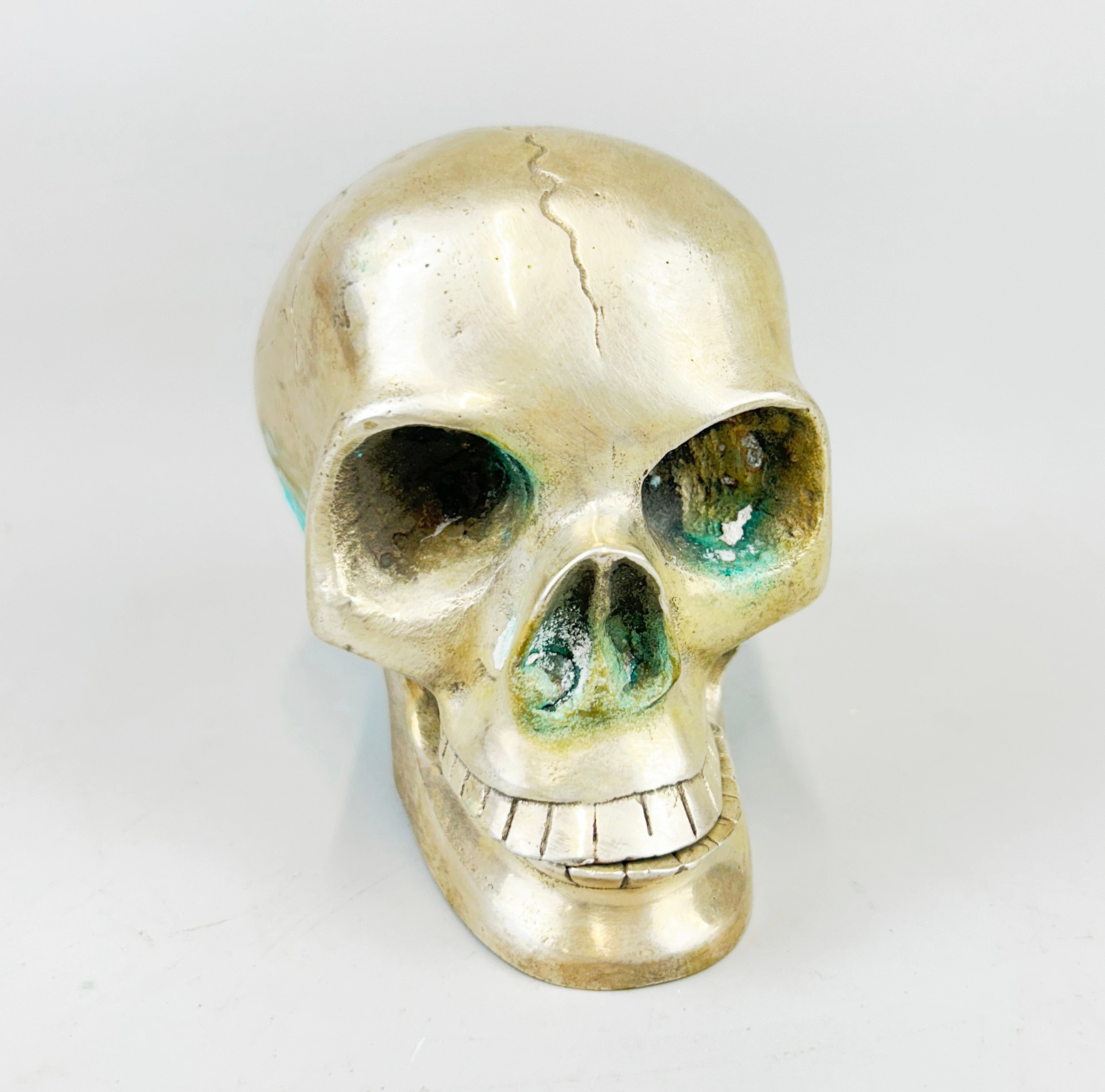 SILVER PLATED SKULL.