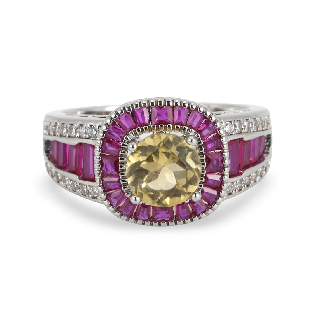 WHITE METAL CITRINE SET RING.