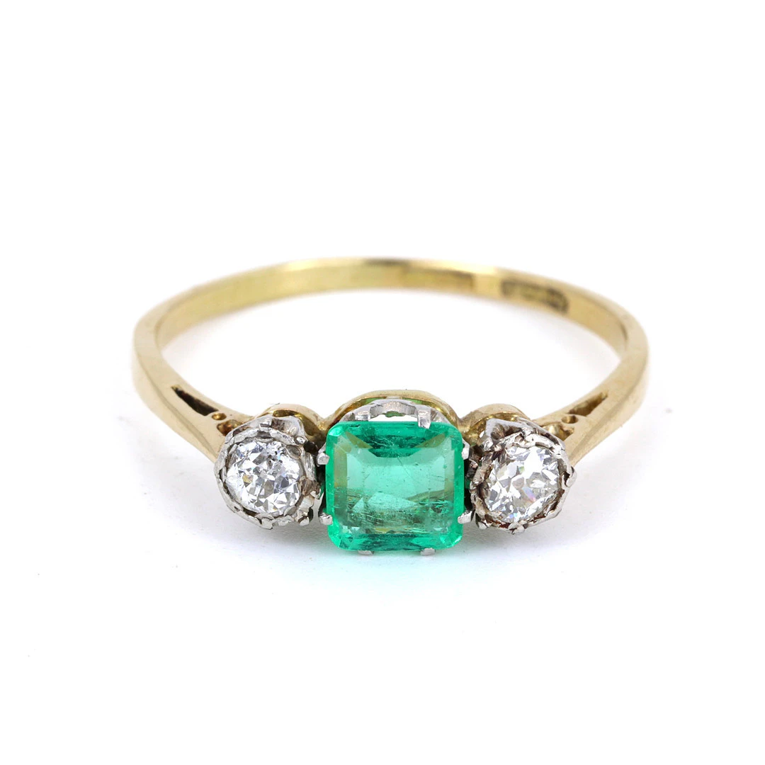 18CT GOLD & PLATINUM EMERALD & DIAMOND RING.