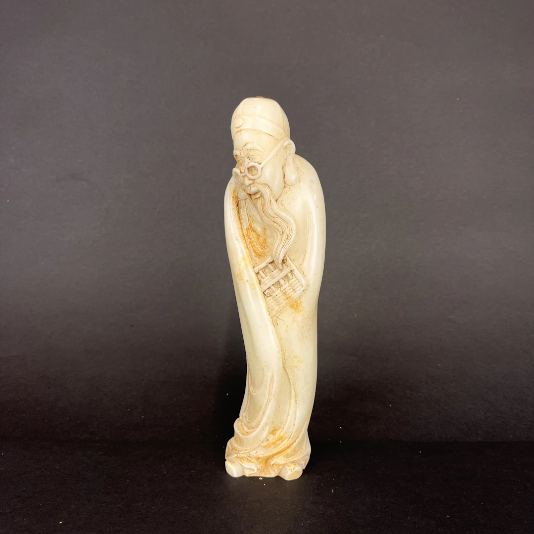 CHINESE WHITE JADE DEITY.