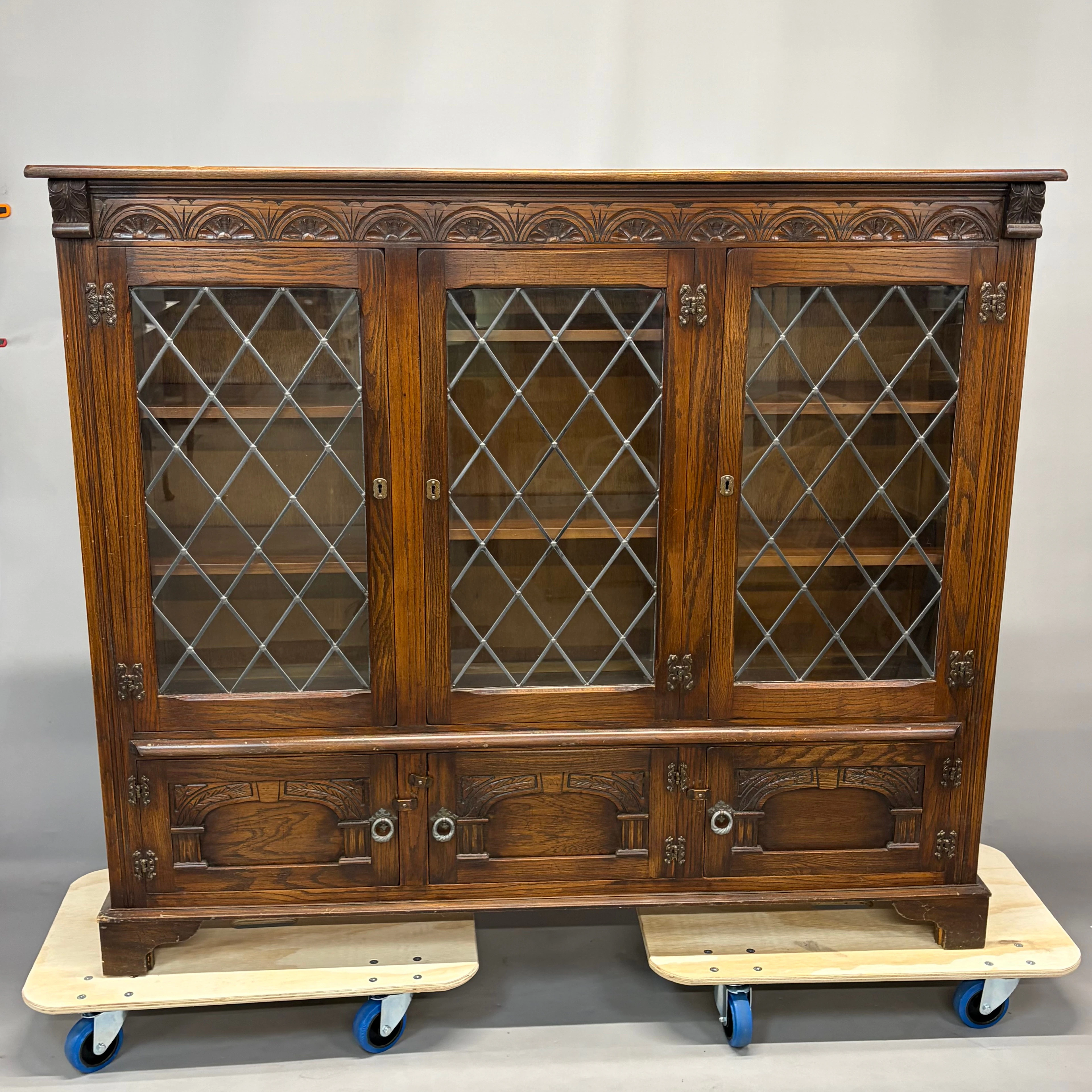 CARVED OAK BOOKCASE.