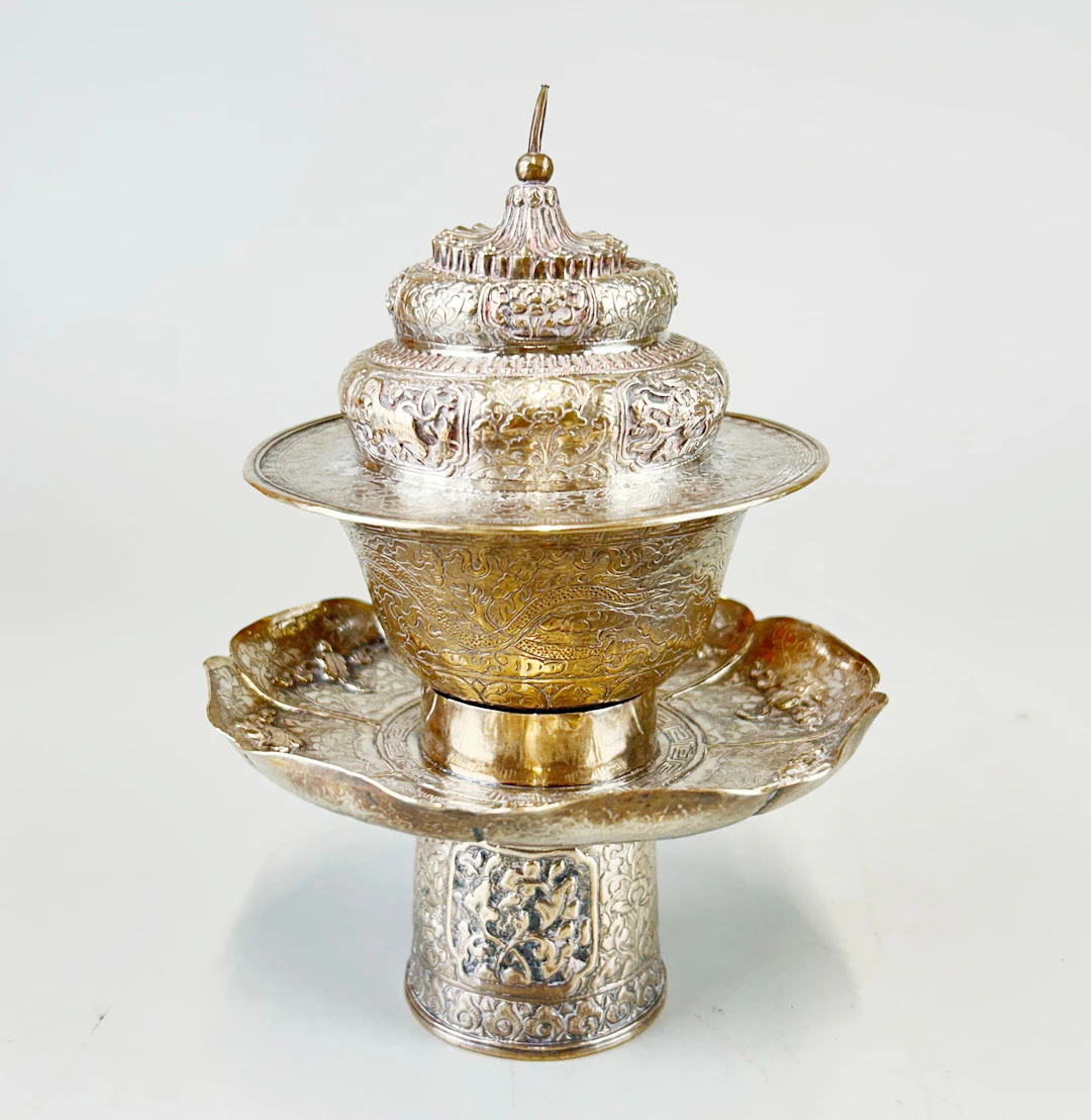THREE TIBETAN WHITE METAL ITEMS.