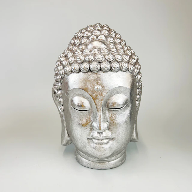 SILVERED COMPOSITION BUDDHA HEAD.