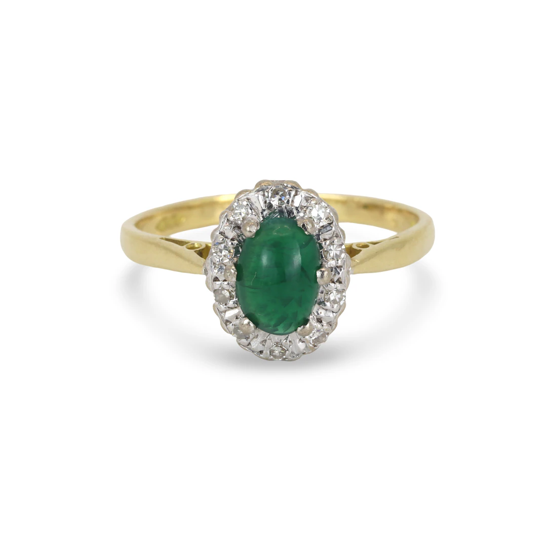 18CT GOLD EMERALD & DIAMOND RING.