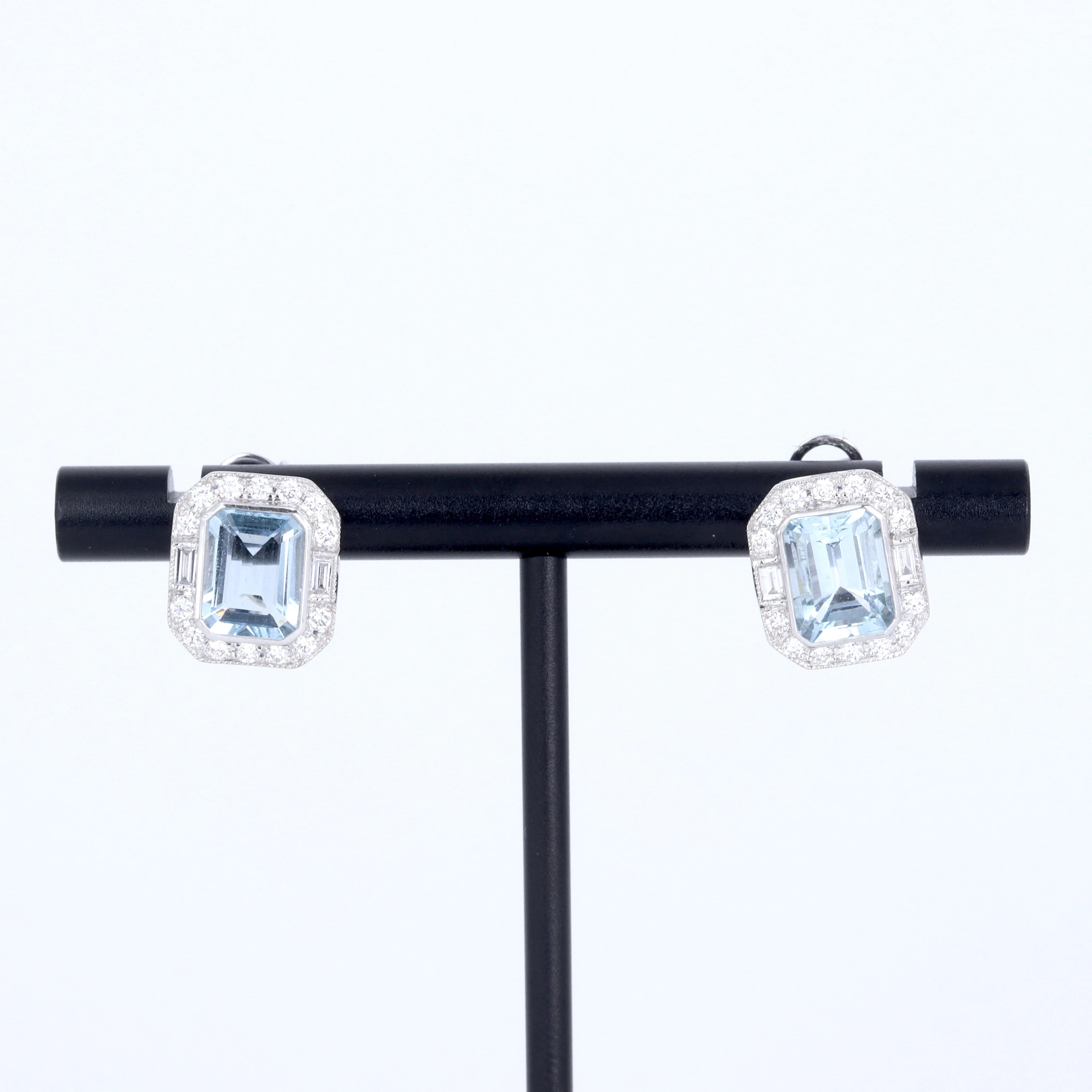 18CT AQUAMARINE AND DIAMOND EARRINGS.