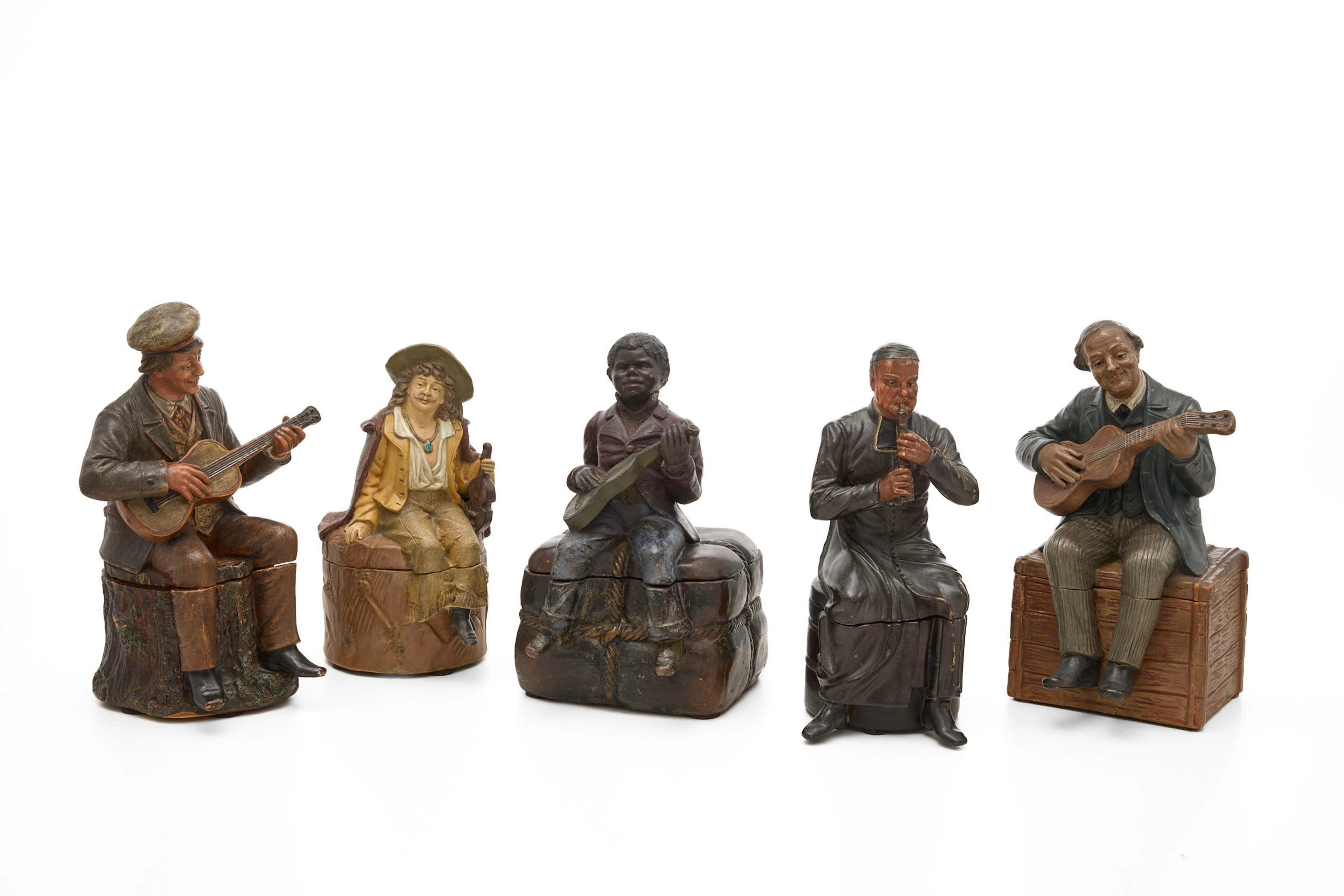"Musiciens", ensemble de 5 pots à tabac en céramique polychromes représentant