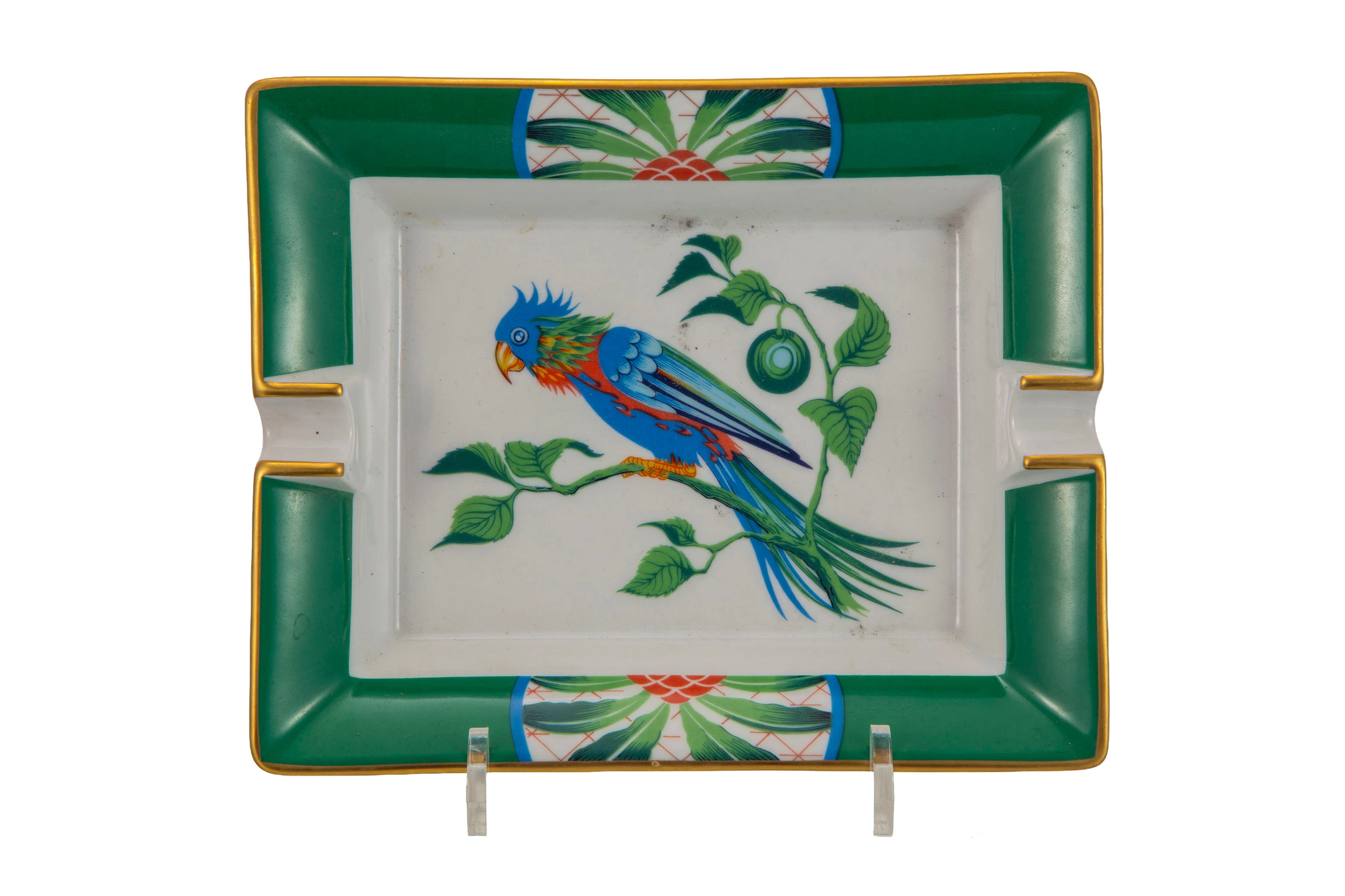 HERMÈS. Vide-poche cendrier en porcelaine, Paris, XXe s., motif perroquet
