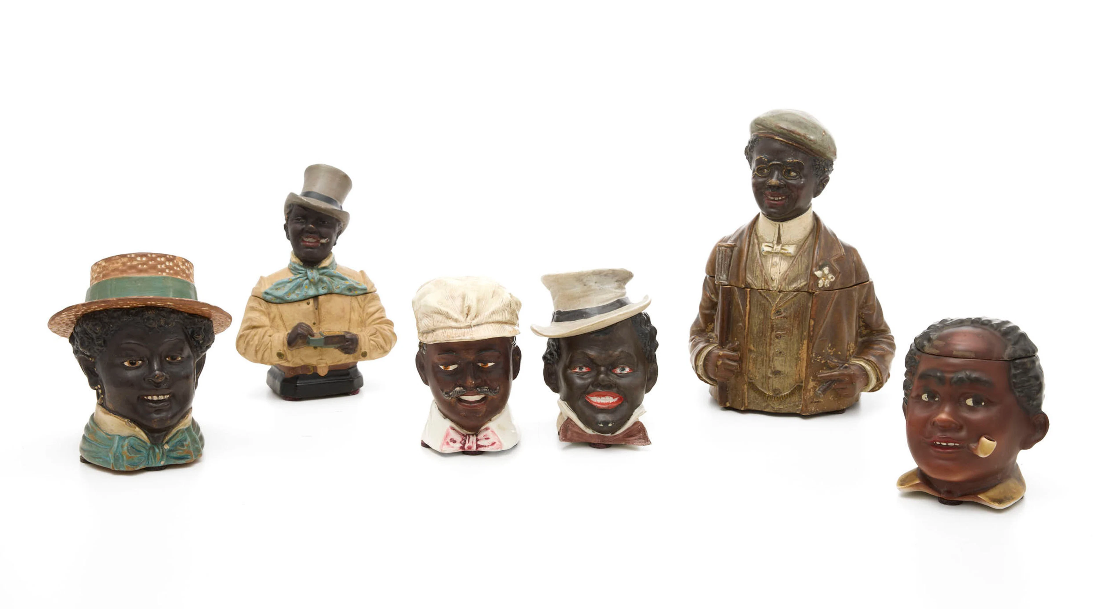 "Figures afro-américaines", réunion de 6 pots à tabac en céramique