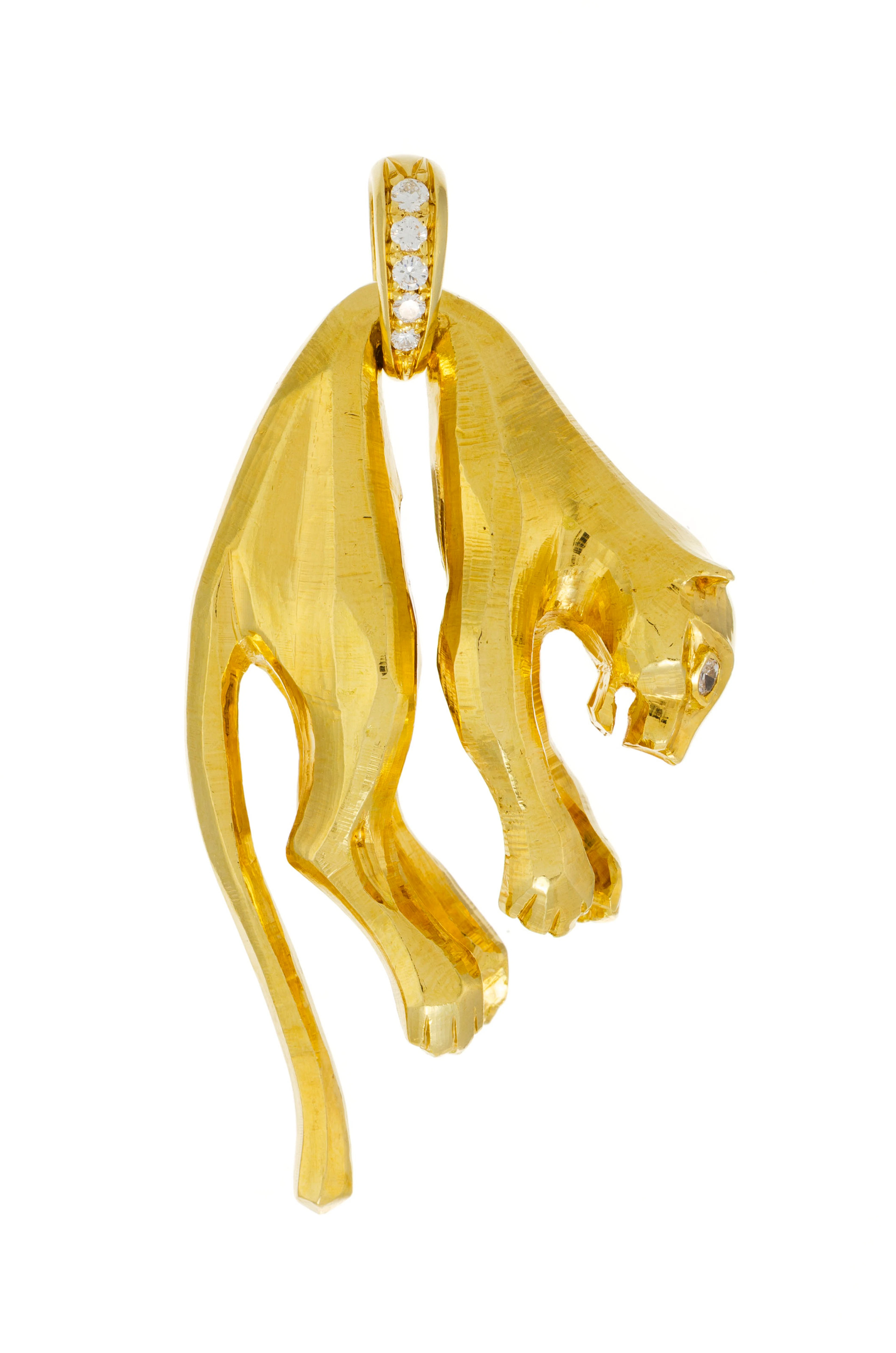 Cartier, pendentif panthère or 750, les yeux sertis de deux diamants