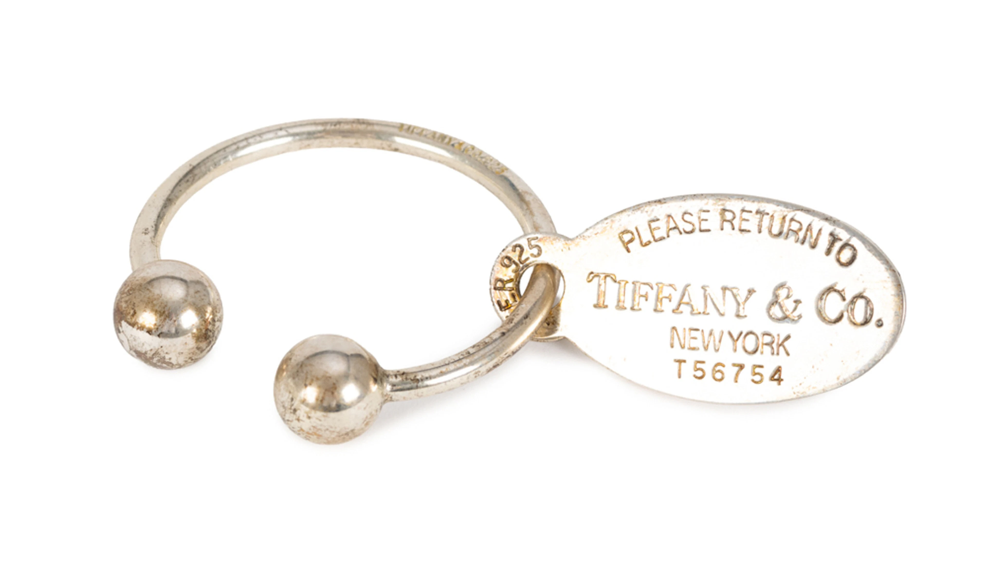 Tiffany & Co, porte clef ovale en argent 'Return to Tiffany' tag, housse, boîte