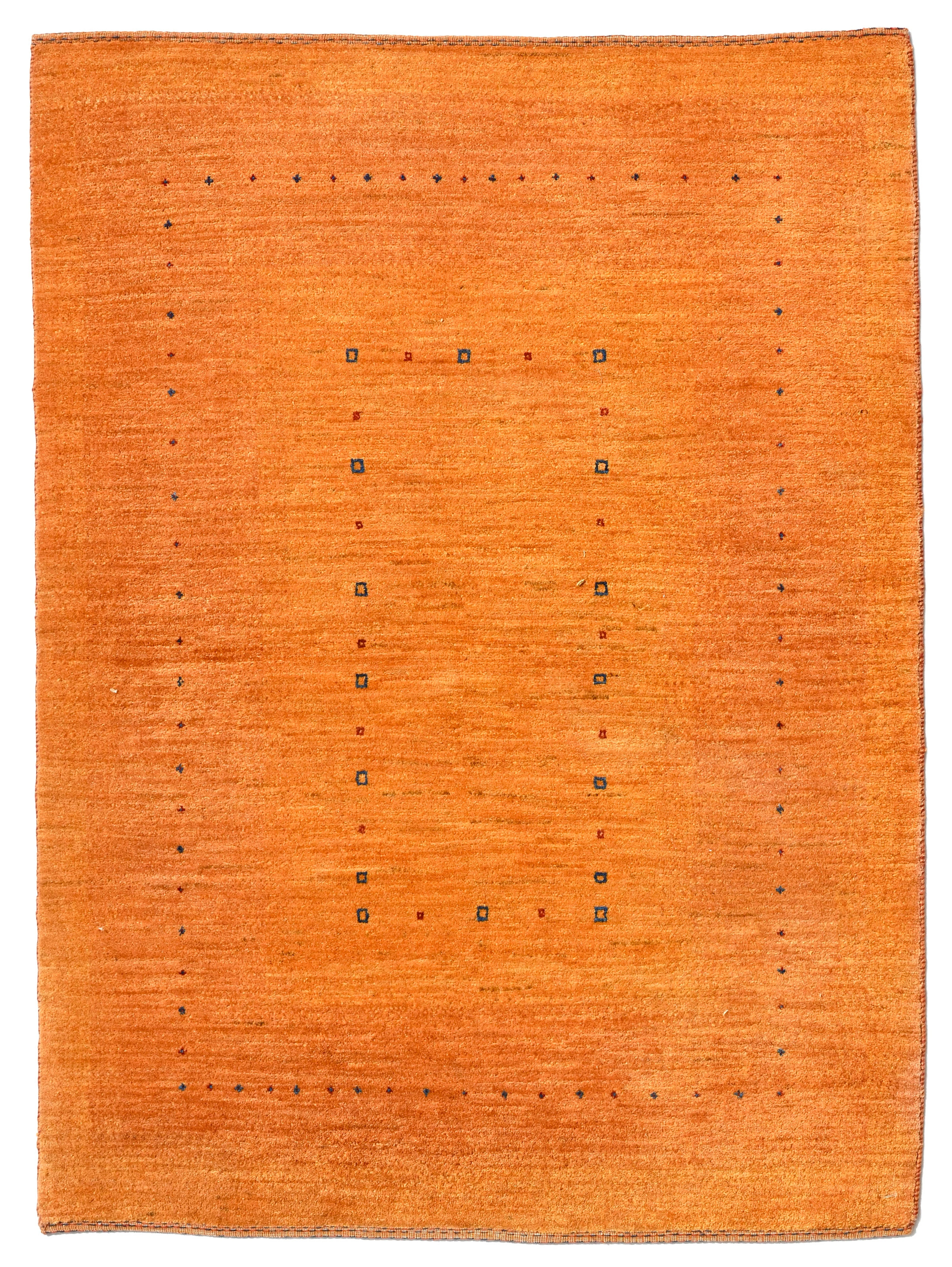 Tapis Gabbeh, Iran, début du XXIe s., à fond orange nuancé parsemé