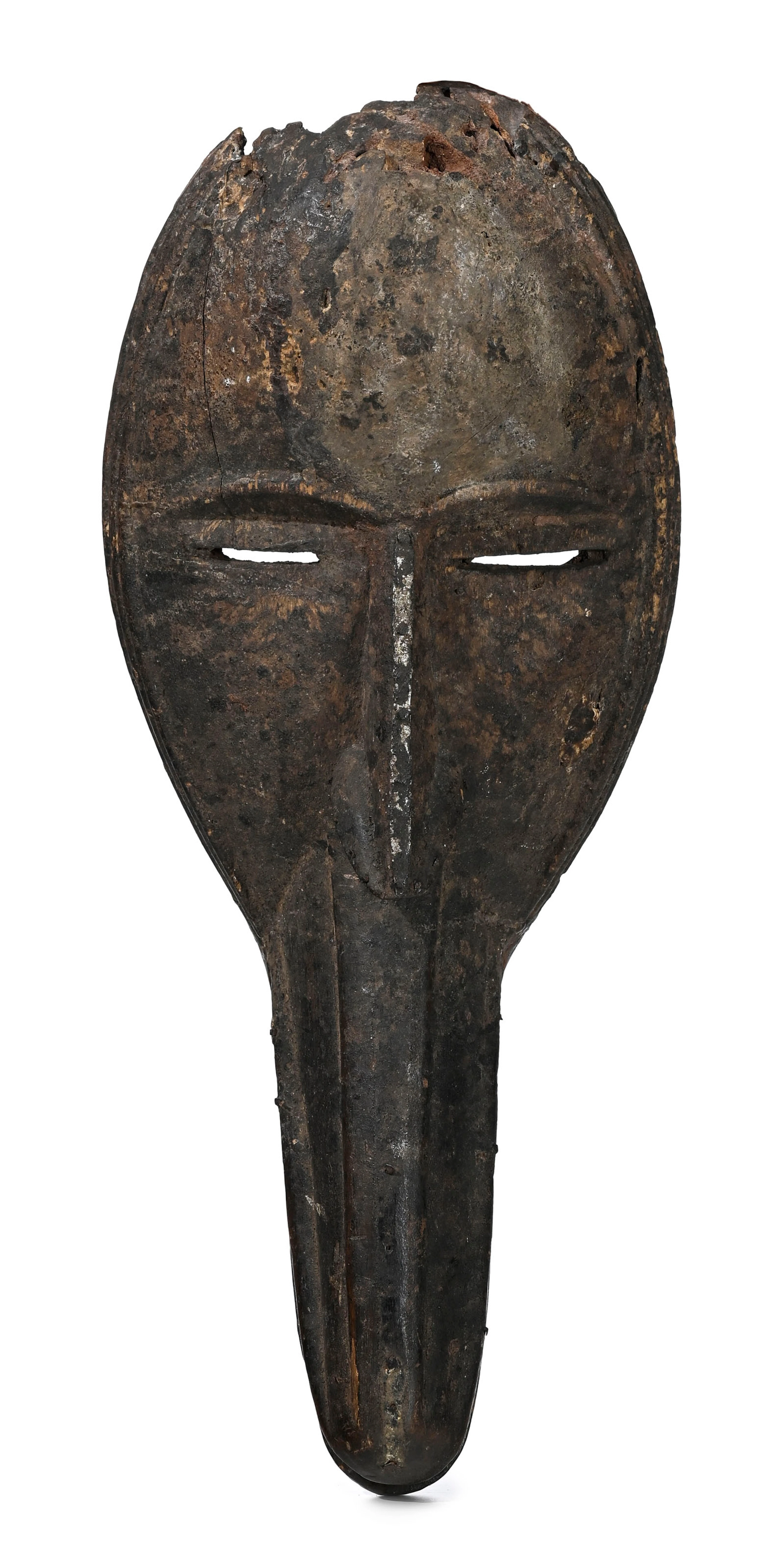 Masque anthropo-zoomorphe Dan/Mahou, bois à patine brun foncé et croûteuse
