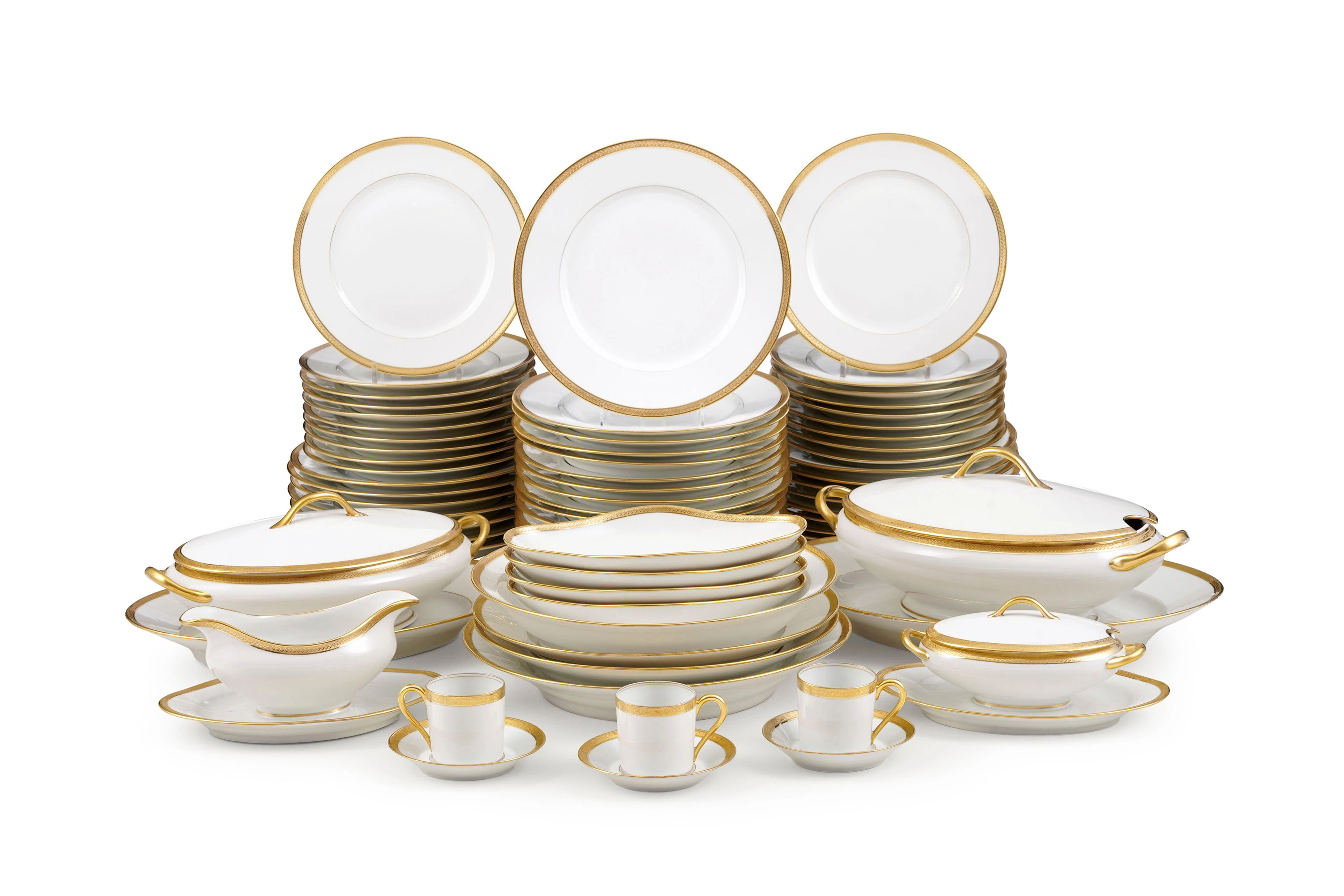 Partie de service en porcelaine, Limoges, à décor or, comprenant 76
