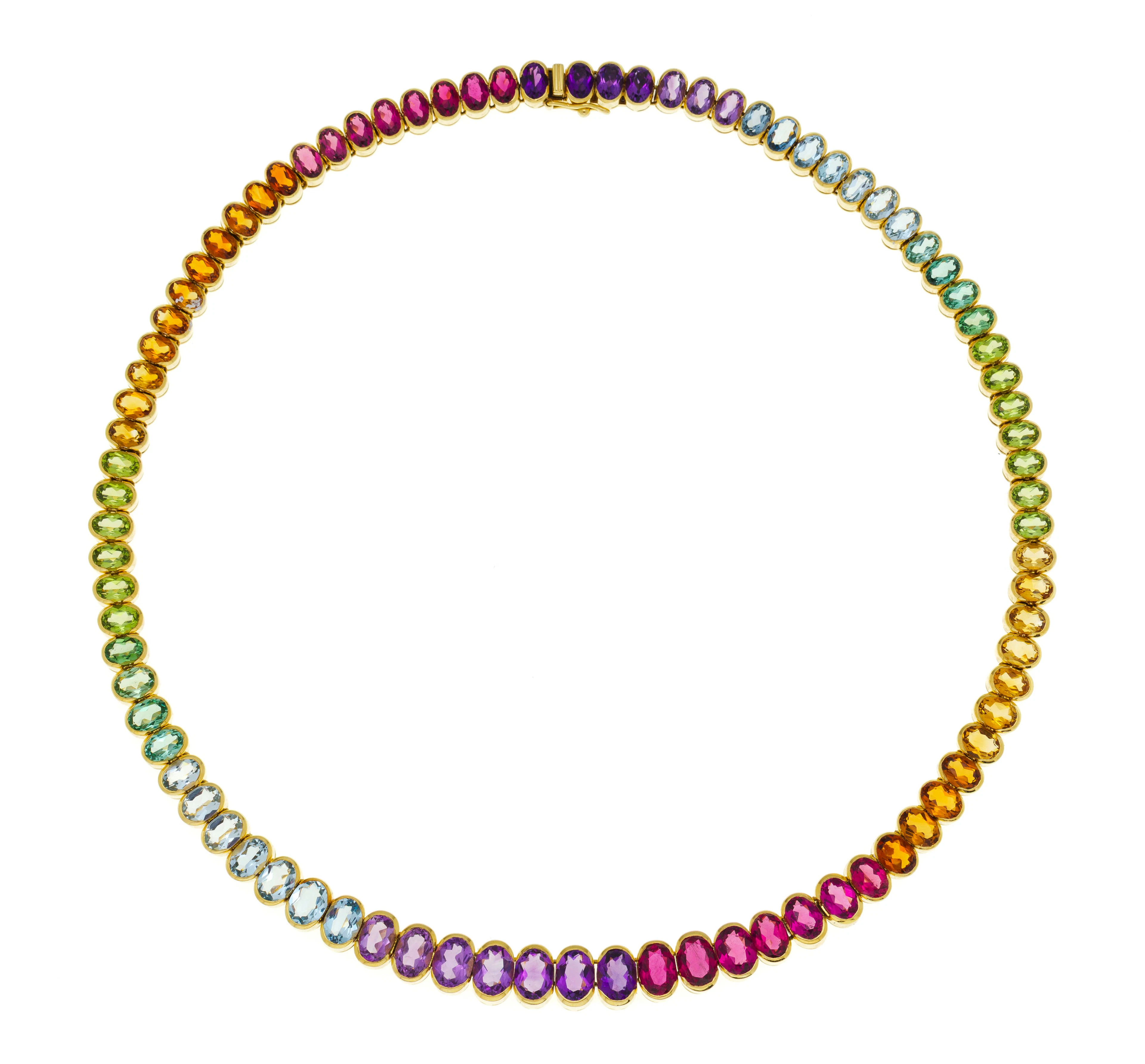 Collier or 750 serti d'un arc-en-ciel de pierres diverses dont des