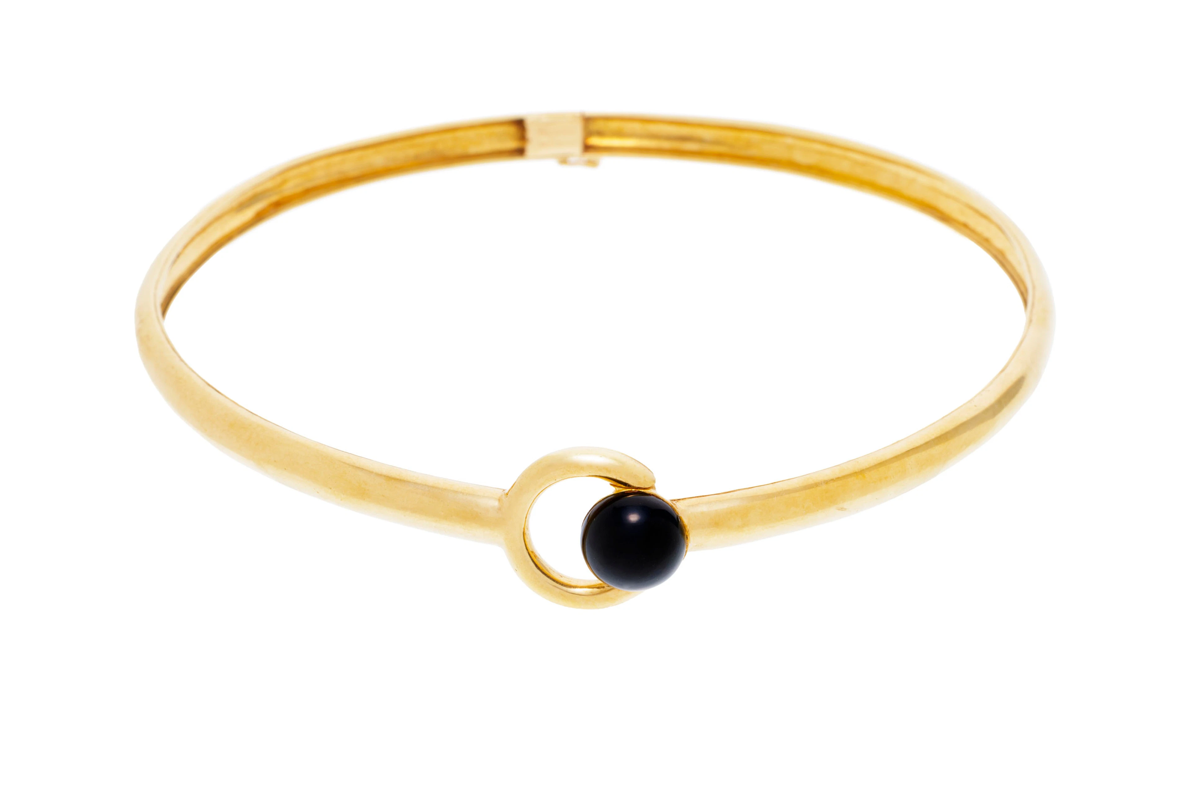 Cartier, collier tour de cou or 750 centrant un motif circulaire ajouré