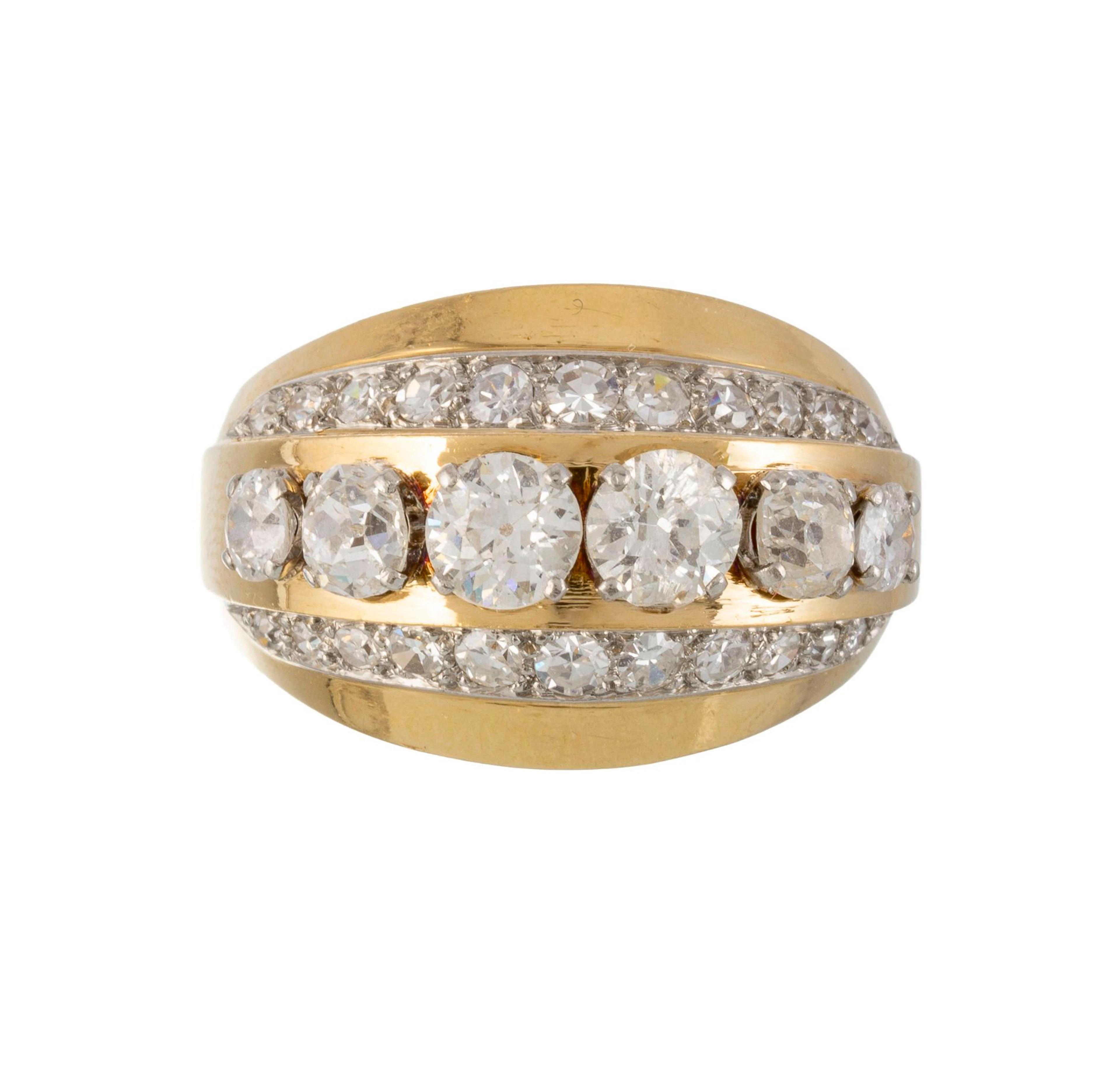 Bague années 1940-50 en or 750 et platine, sertie de trois lignes