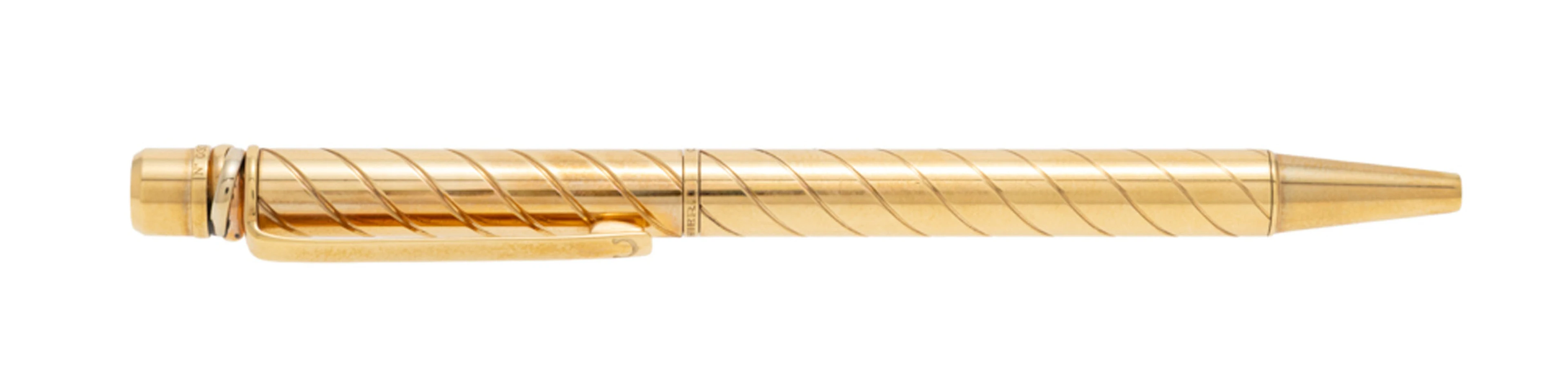 Cartier, stylo bille en or 750 rainuré, signé, numéroté 033, long.