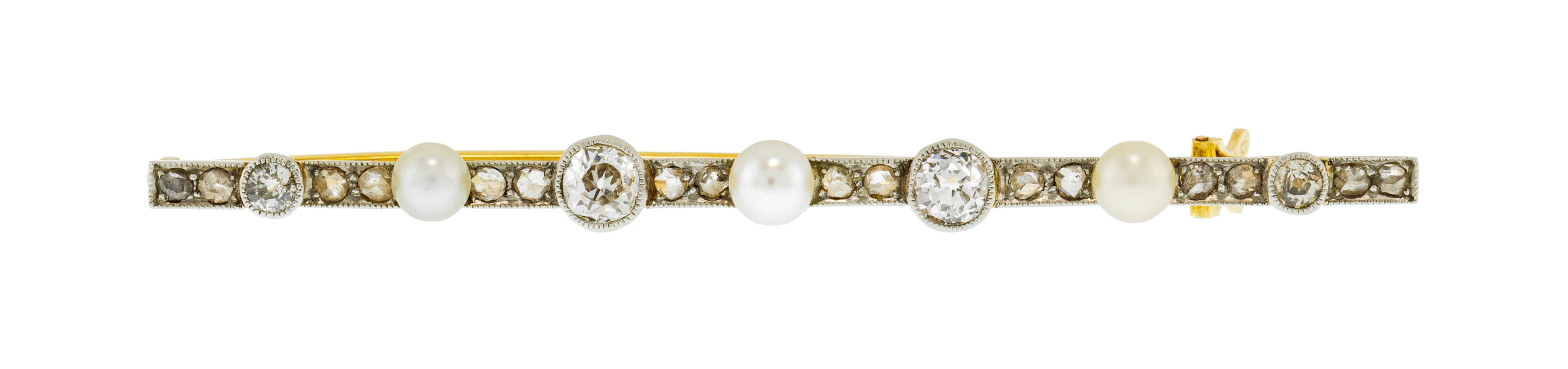 Broche barrette début XXe s., or 750 et platine sertie de perles blanches