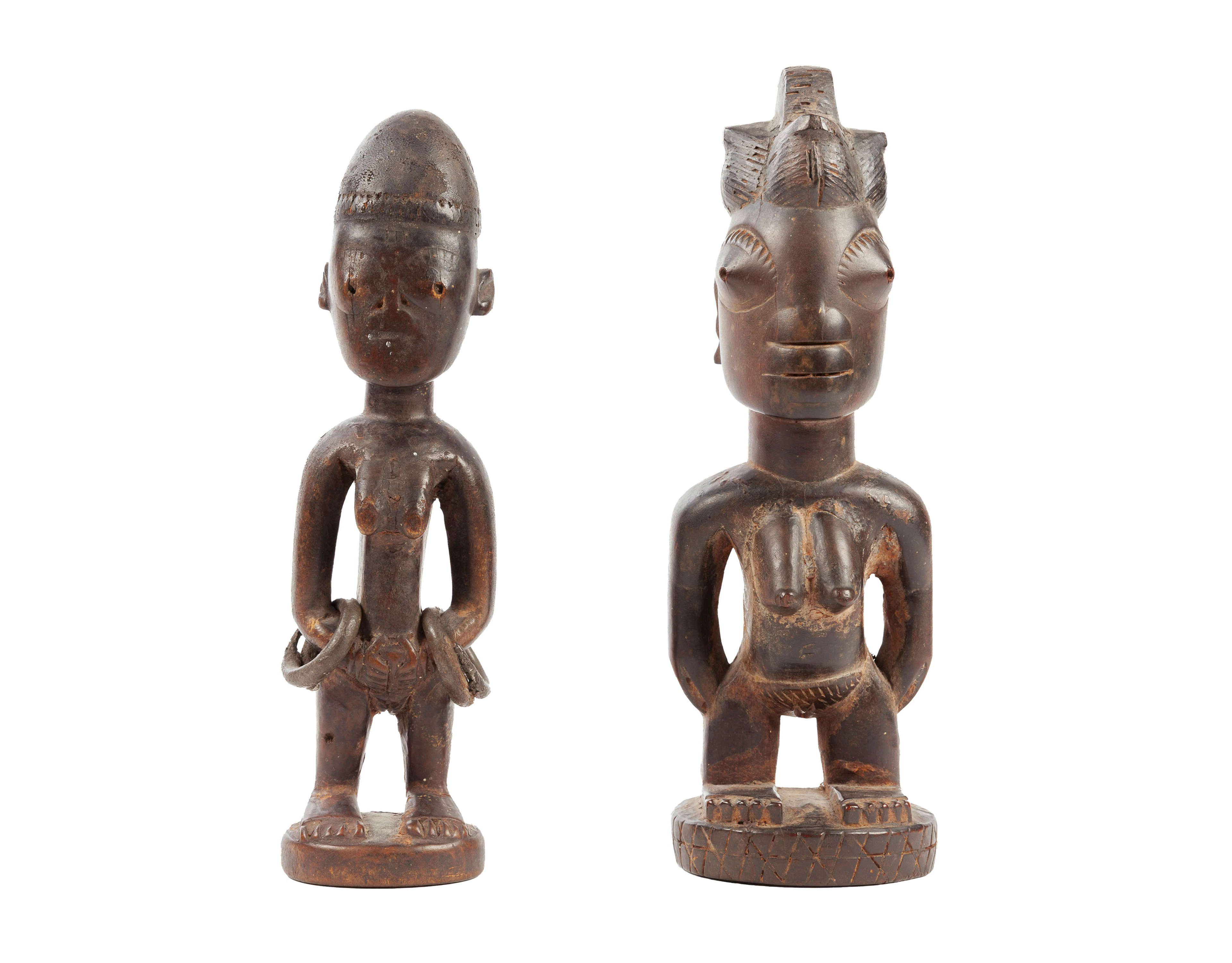 2 statuettes féminines Ibedji Yoruba, bois à patine brun foncé et