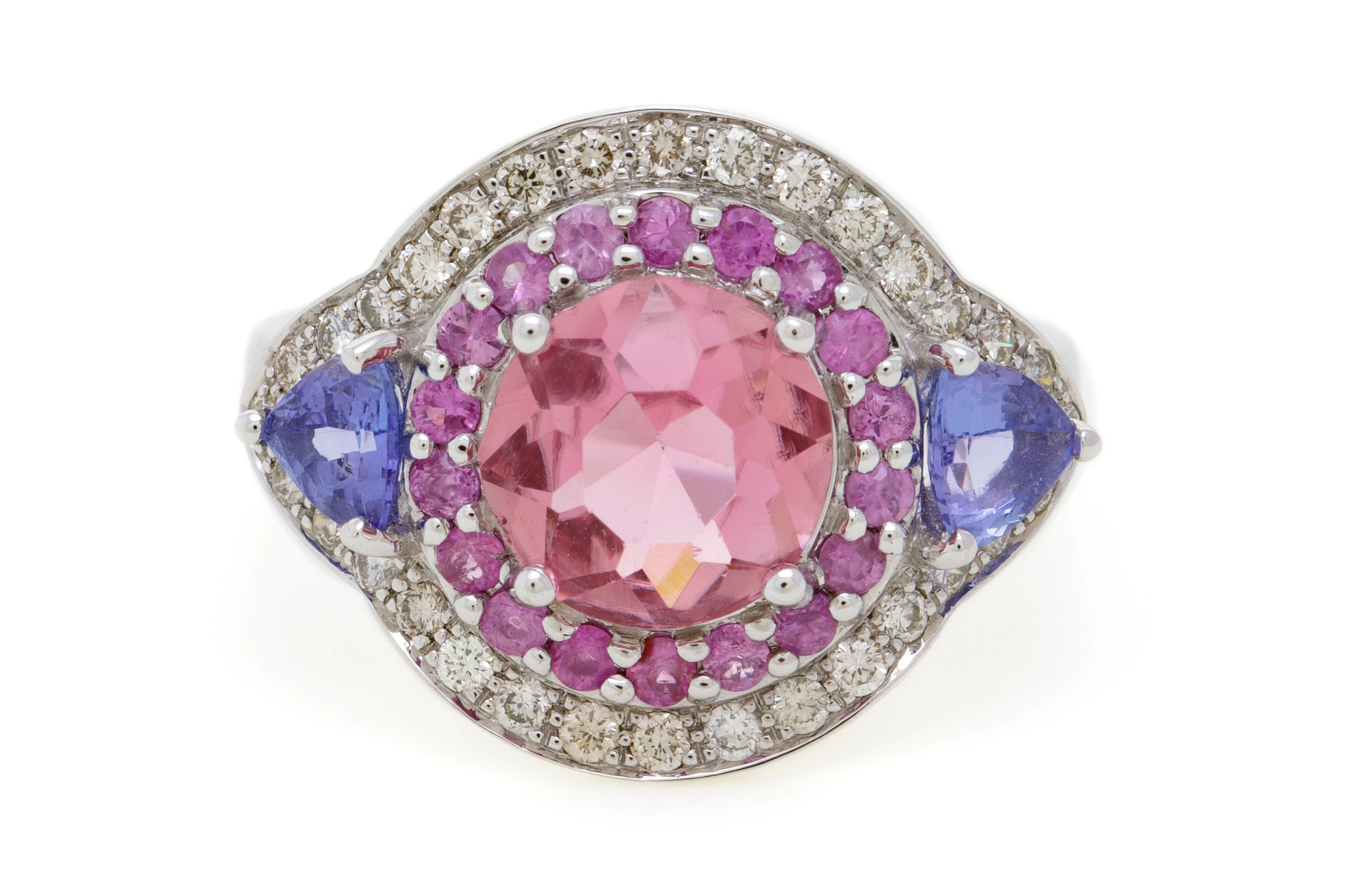 Bague or gris 750 sertie d'une tourmaline rose entourée de deux tanzanites