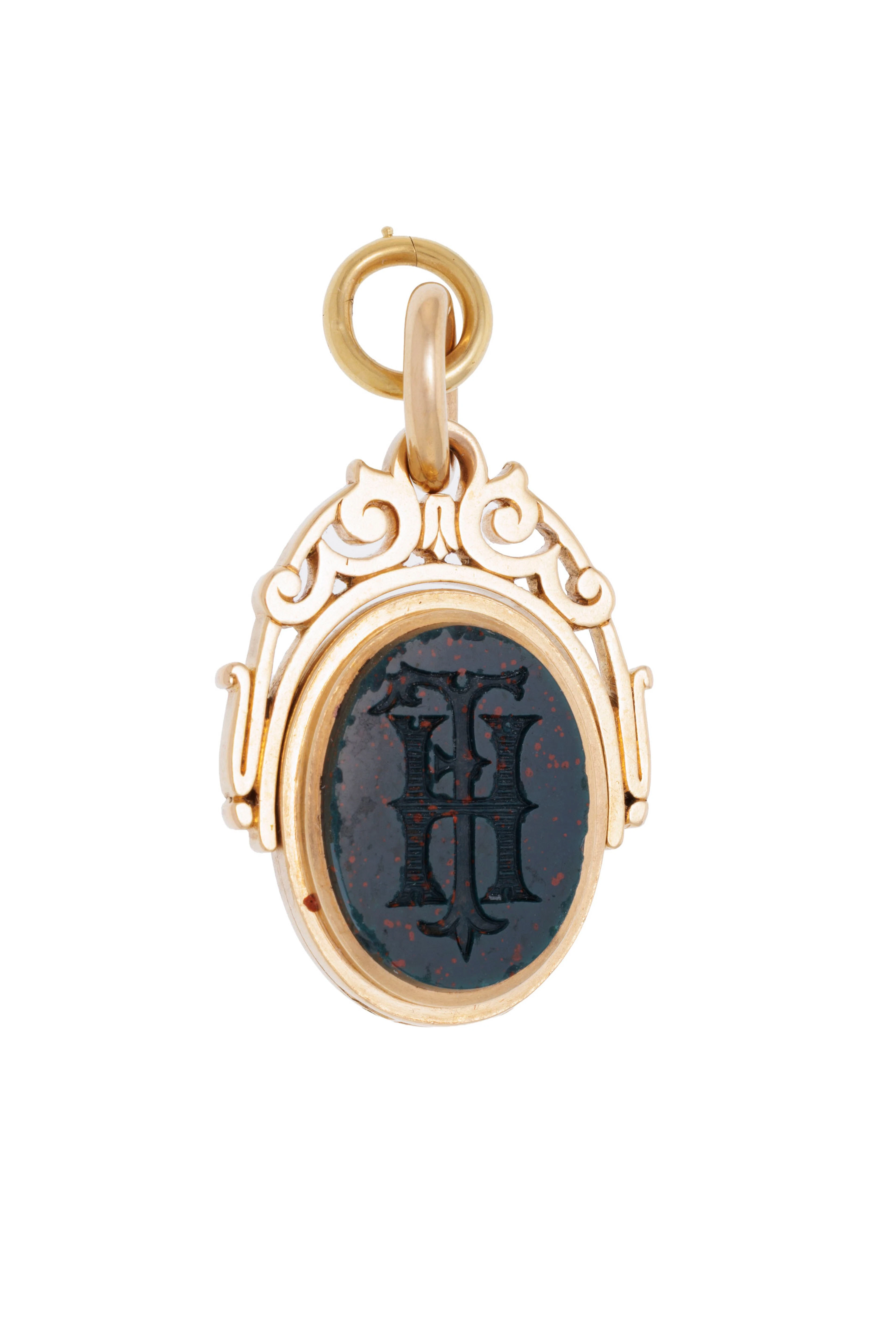 Pendentif-médaillon à sceaux XIXe s., or 750 orné de deux intailles