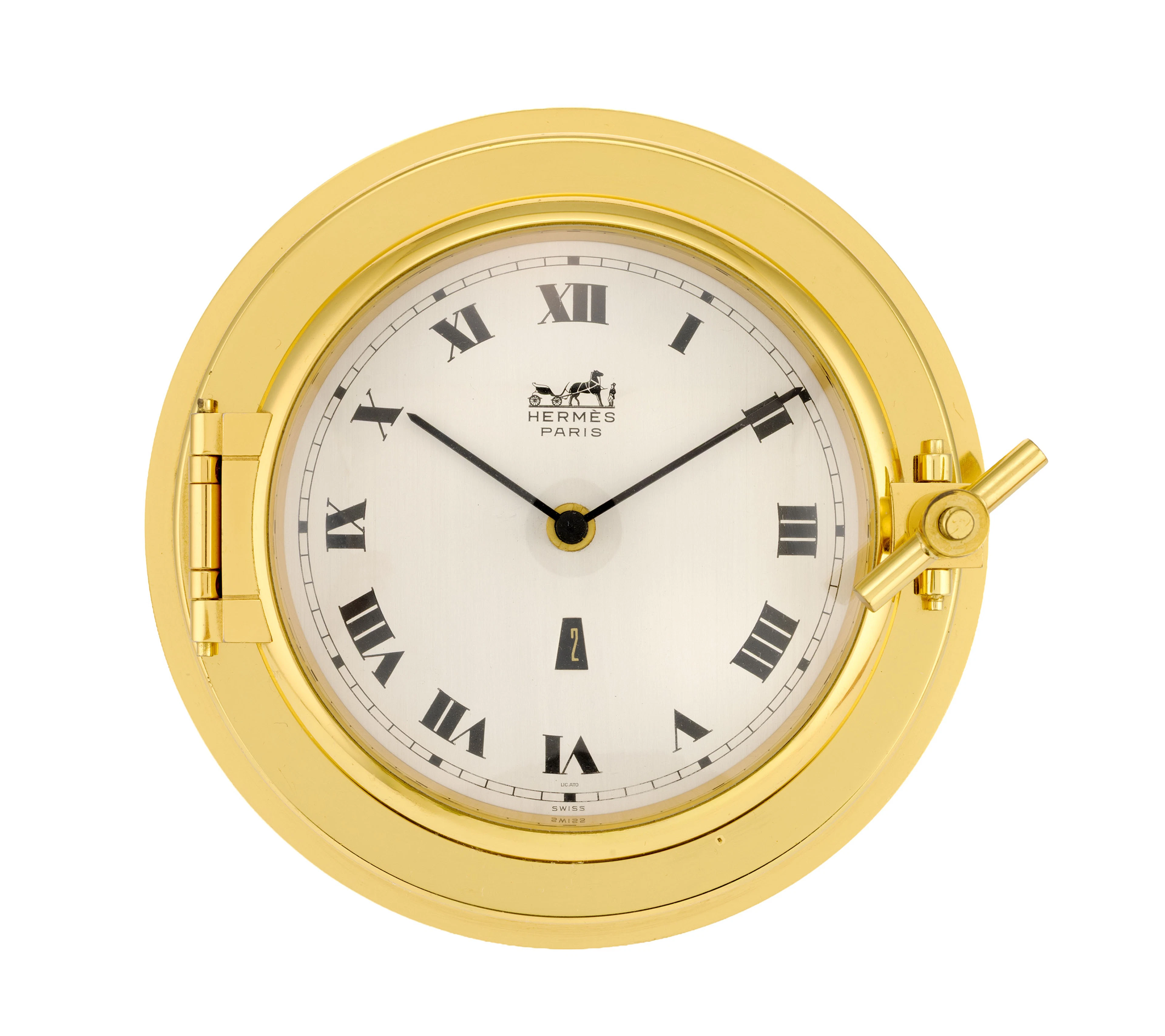 Hermès, pendulette de bureau en métal doré avec indication de la date