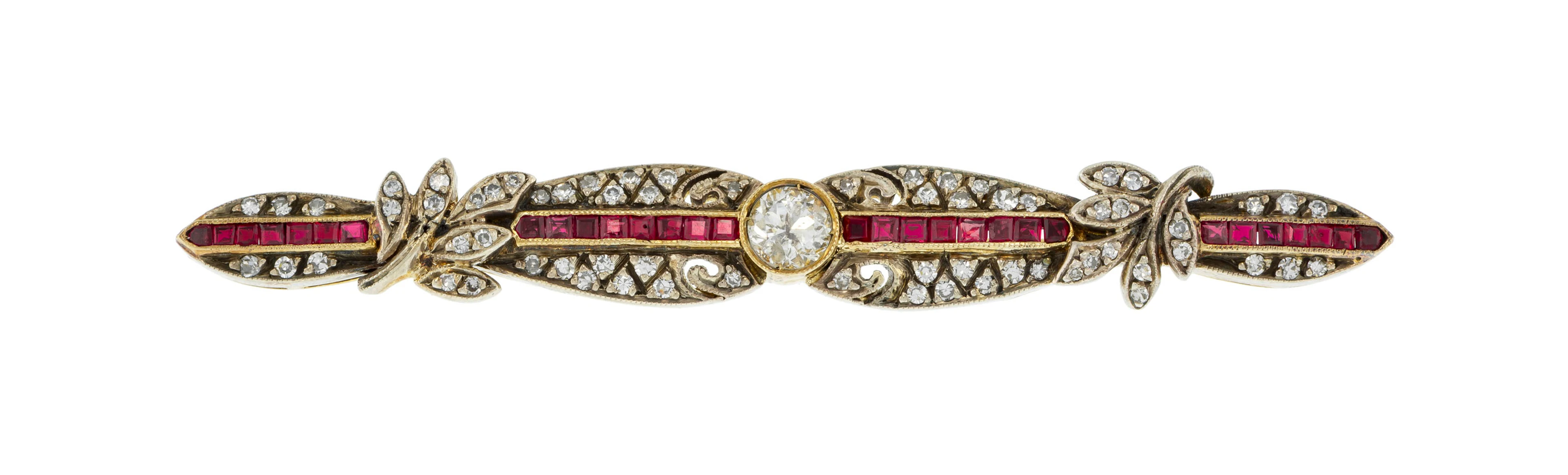 Broche début XXe s., or 750 et argent sertie d'une ligne de rubis