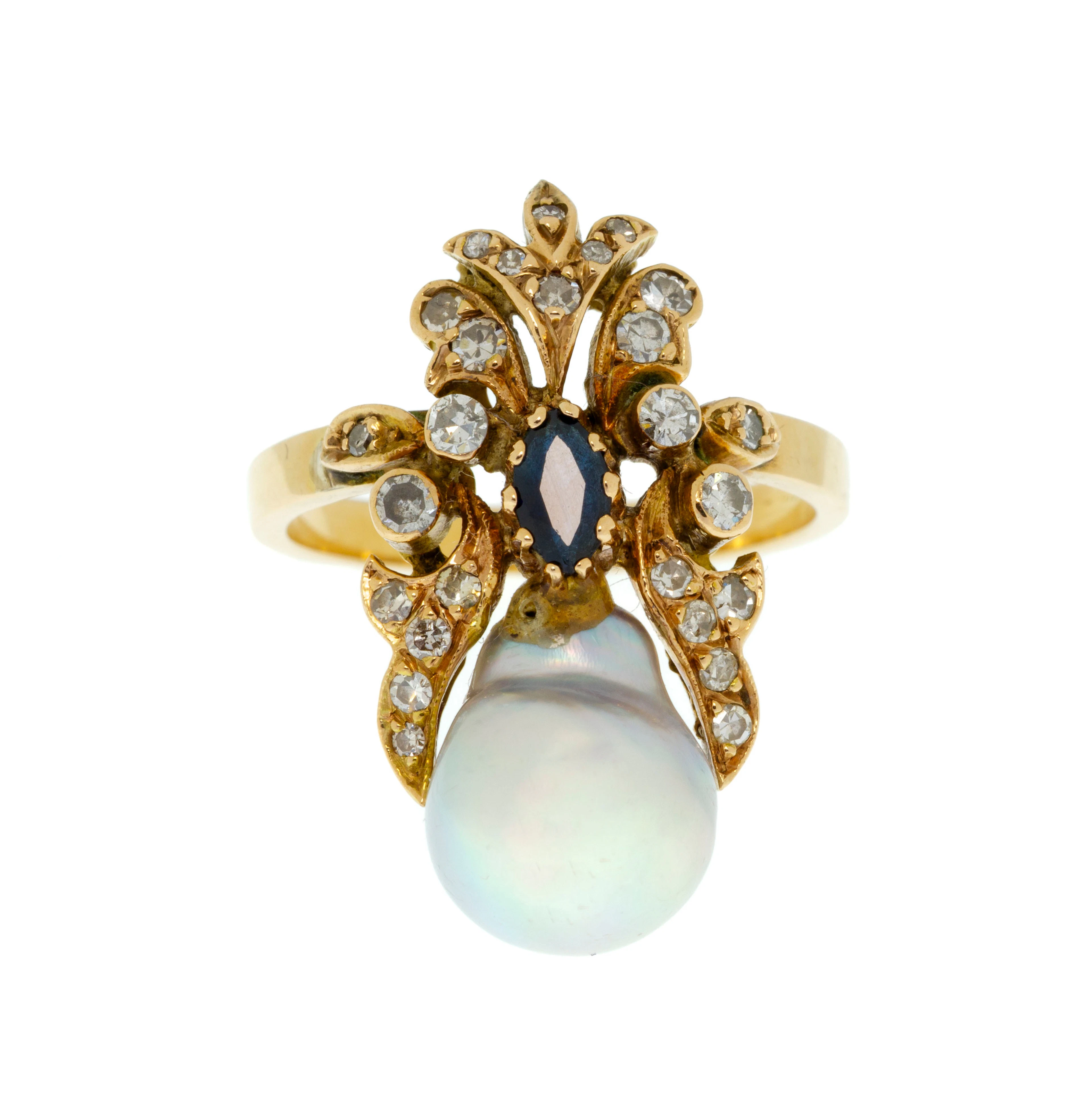 Bague or 750 à motif ajouré serti d'un saphir taille marquise et de