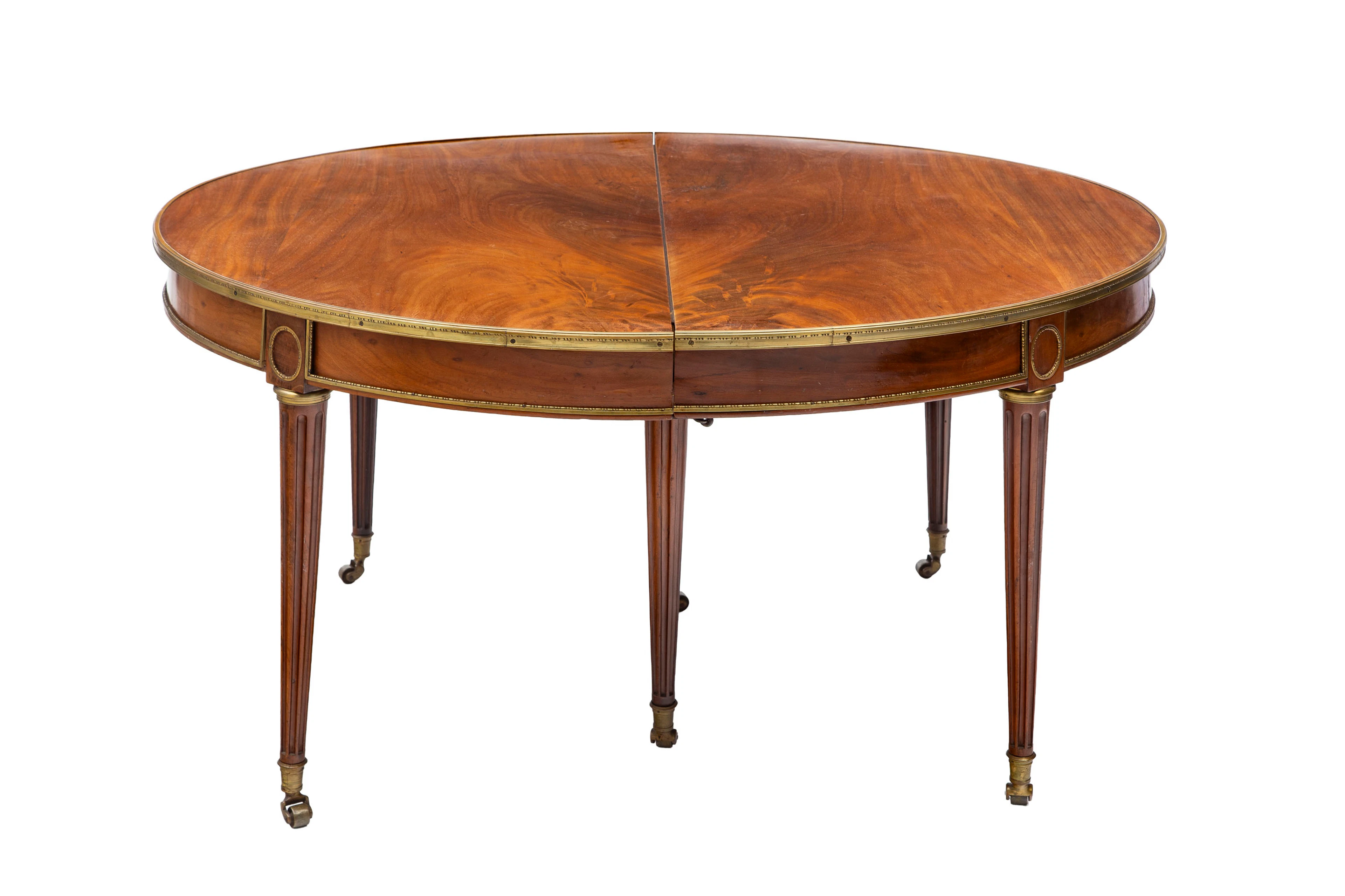Table de salle à manger de style Louis XVI, XIXe s., en acajou et