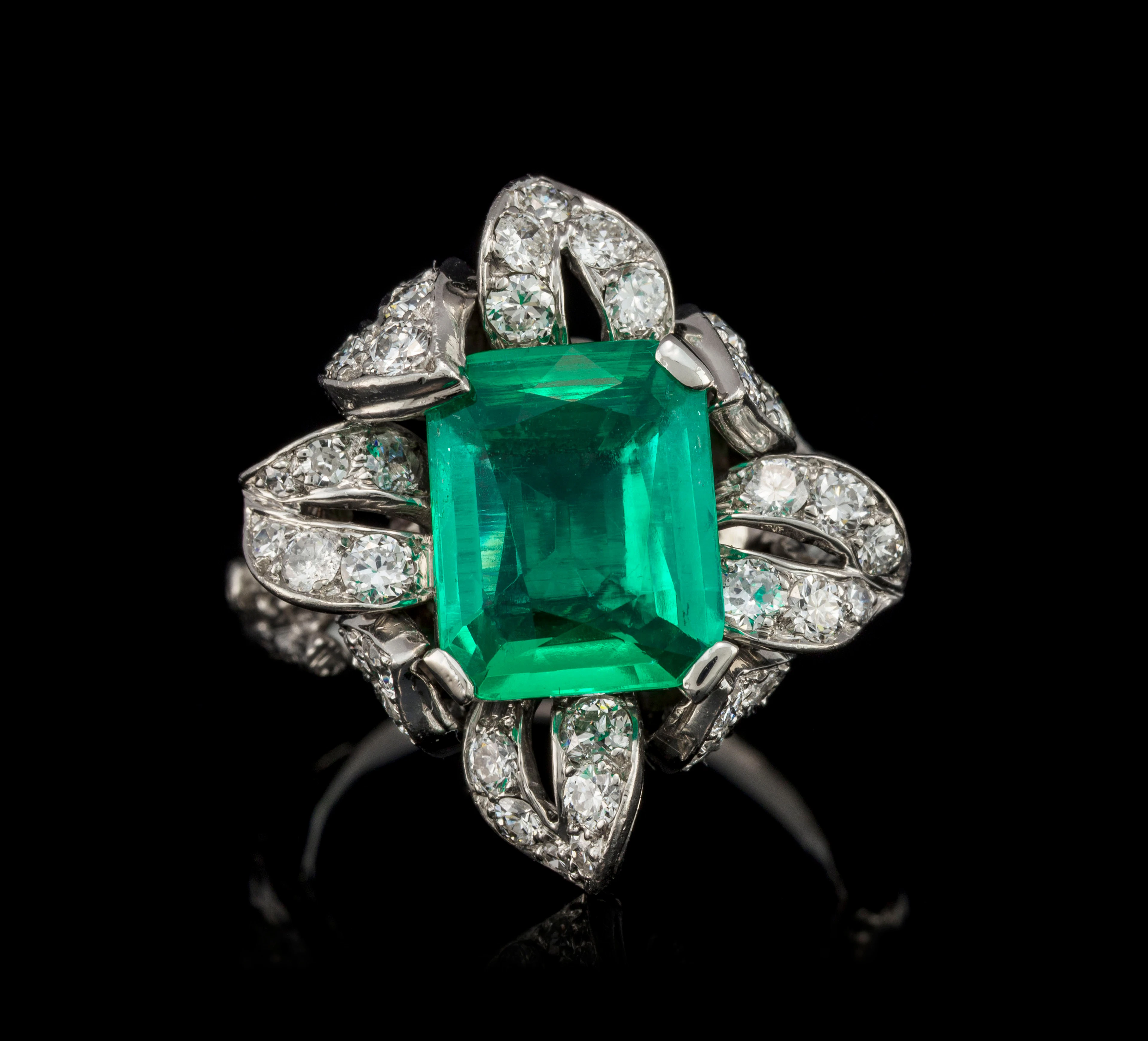 Sterlé, bague années 1950 platine stylisant une branche s'enroulant