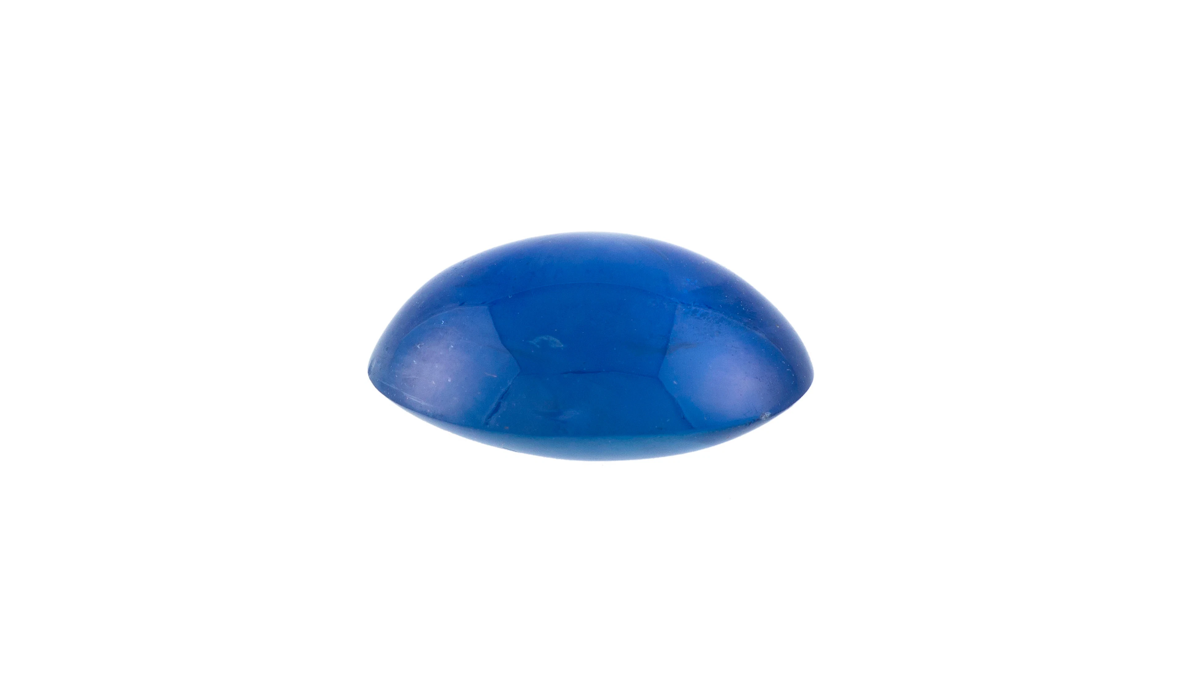 1 saphir étoilé taille cabochon sur papier de 7.88 carats