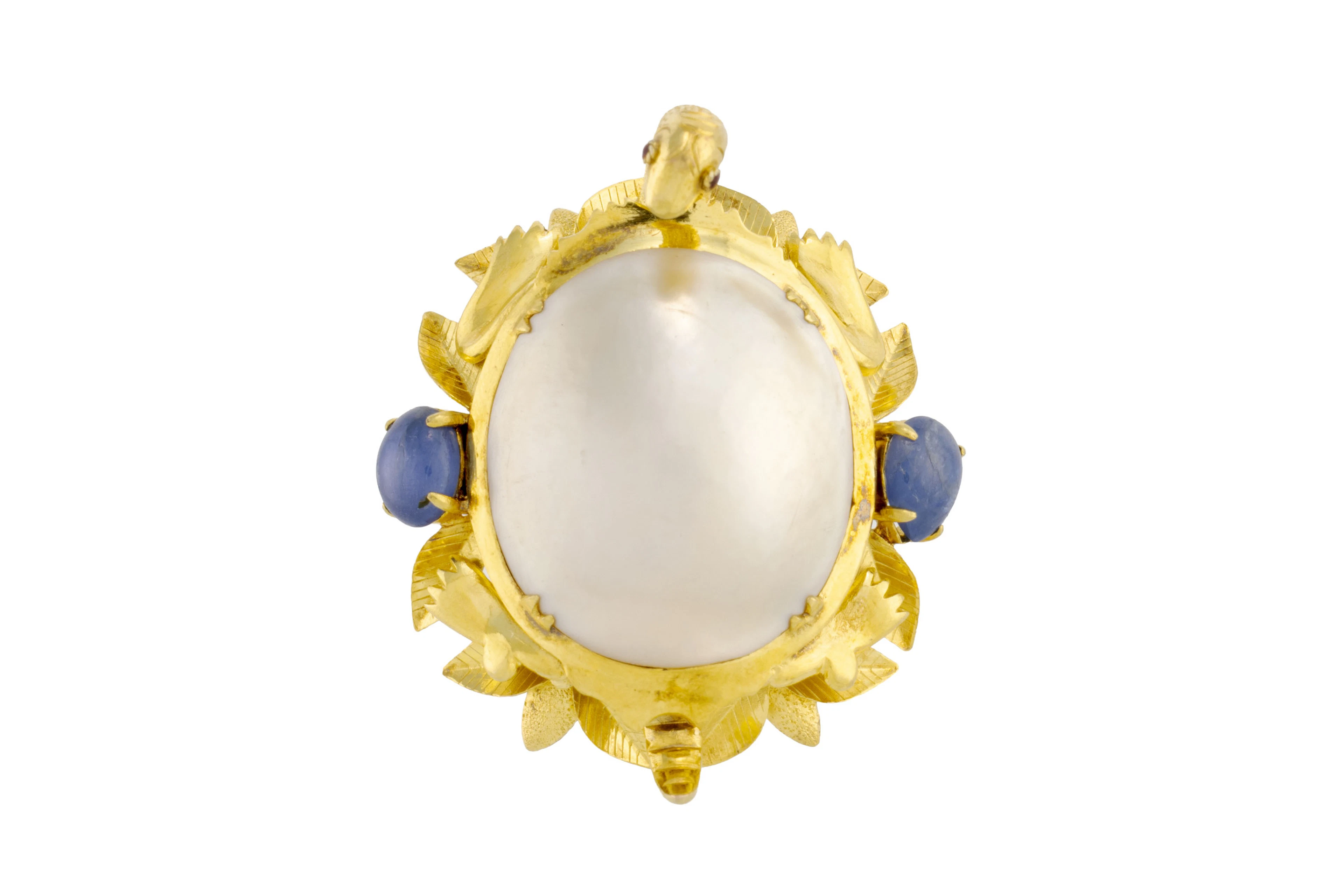 Bague or 585 stylisant une tortue sertie de deux cabochons de saphir