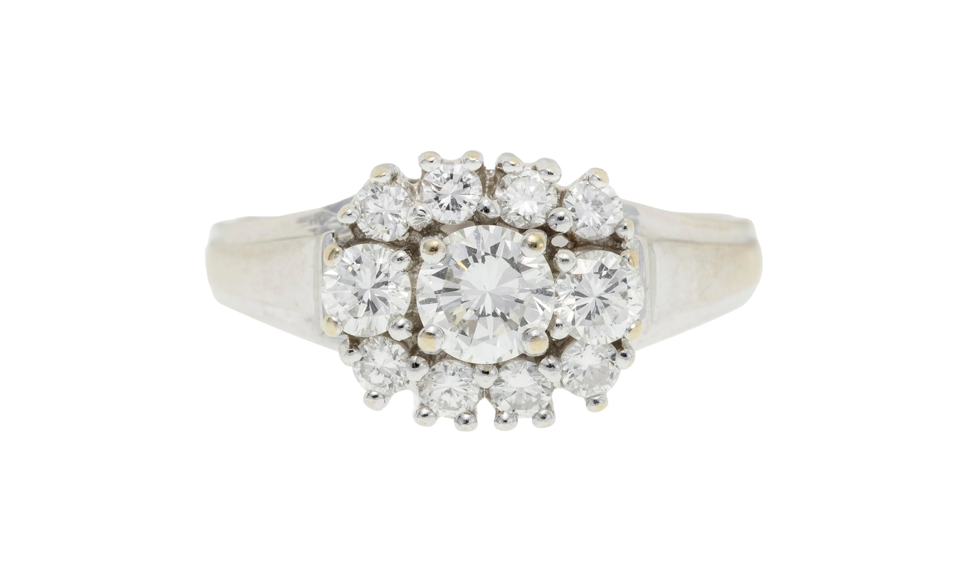 Bague or gris 750 sertie de diamants taille brillant dont un plus