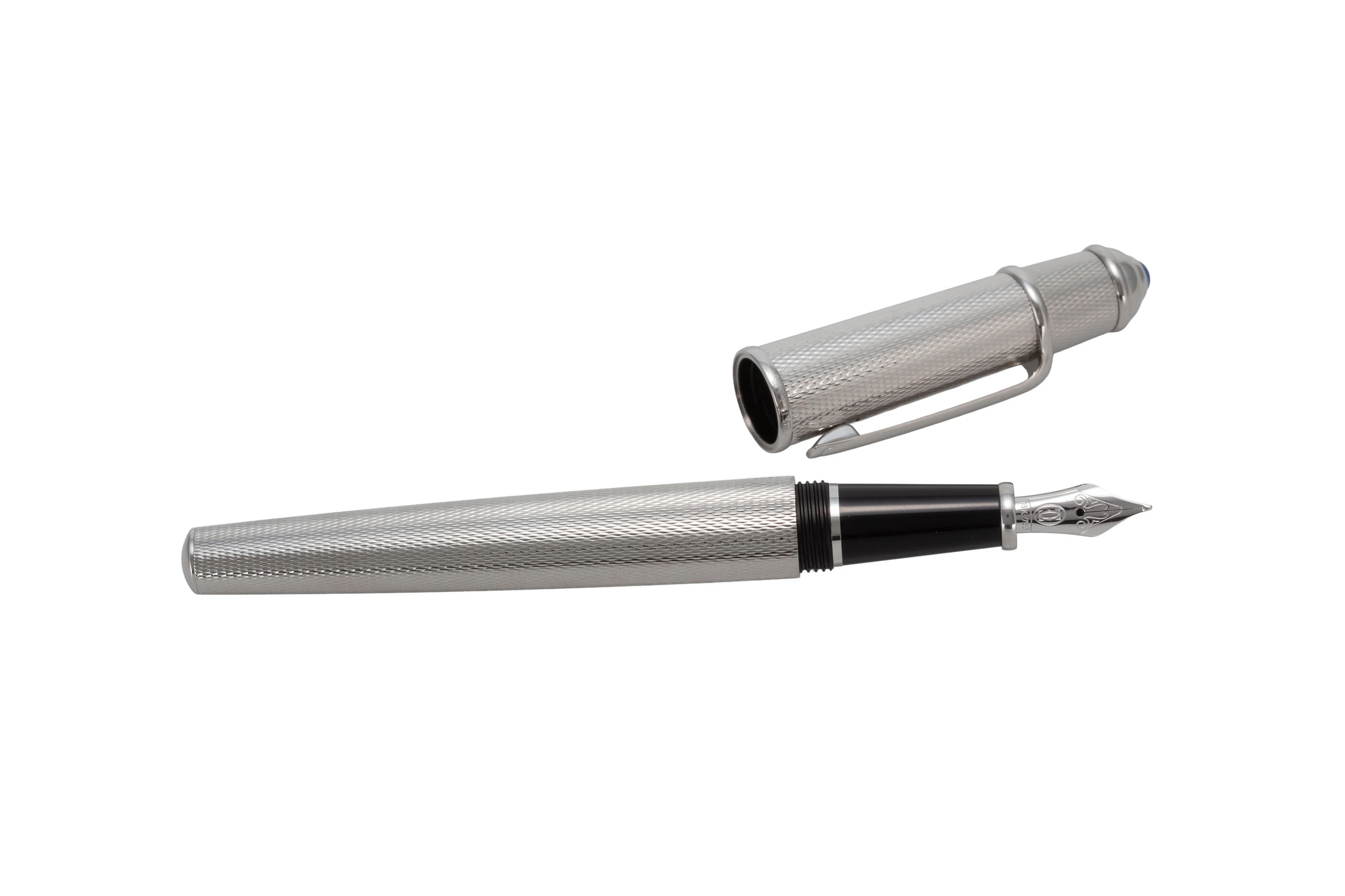 Cartier, stylo plume en métal orné sur le capuchon d'un cabochon en