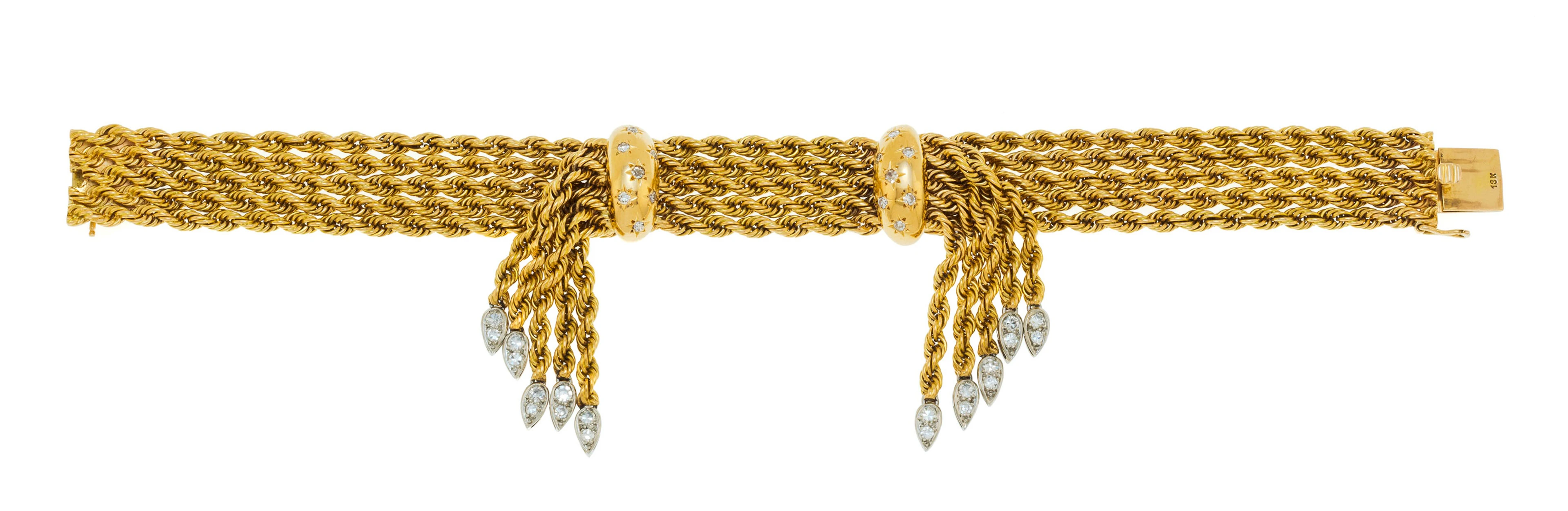 Bracelet années 1940-50 2 ors 750 à maille corde orné de deux agrafes