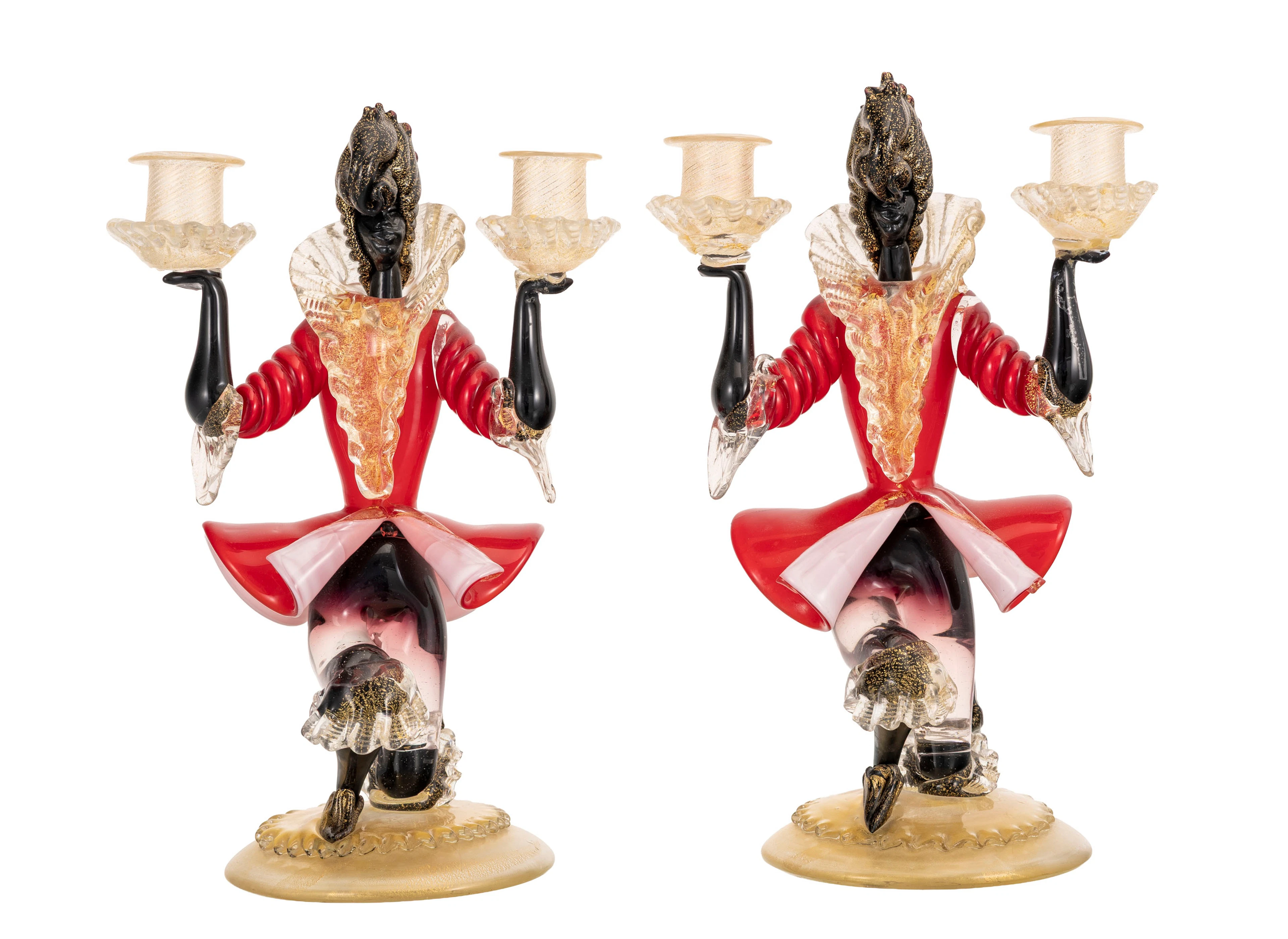 Murano. Paire de candélabres en verre, XXe s., figurant des personnages