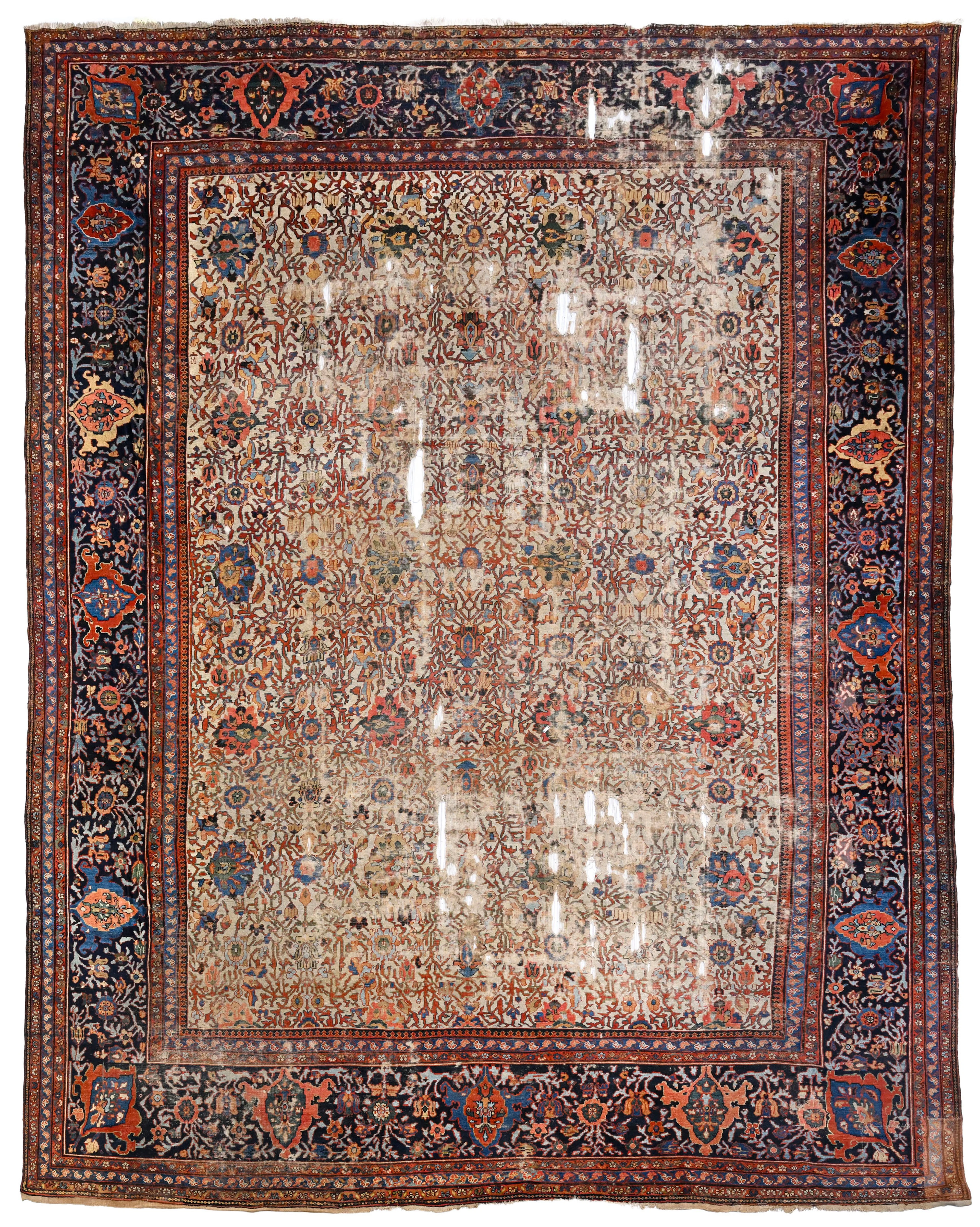 Tapis Heriz, Iran, fin XIXe s., à semis de rinceaux fleuris stylisés