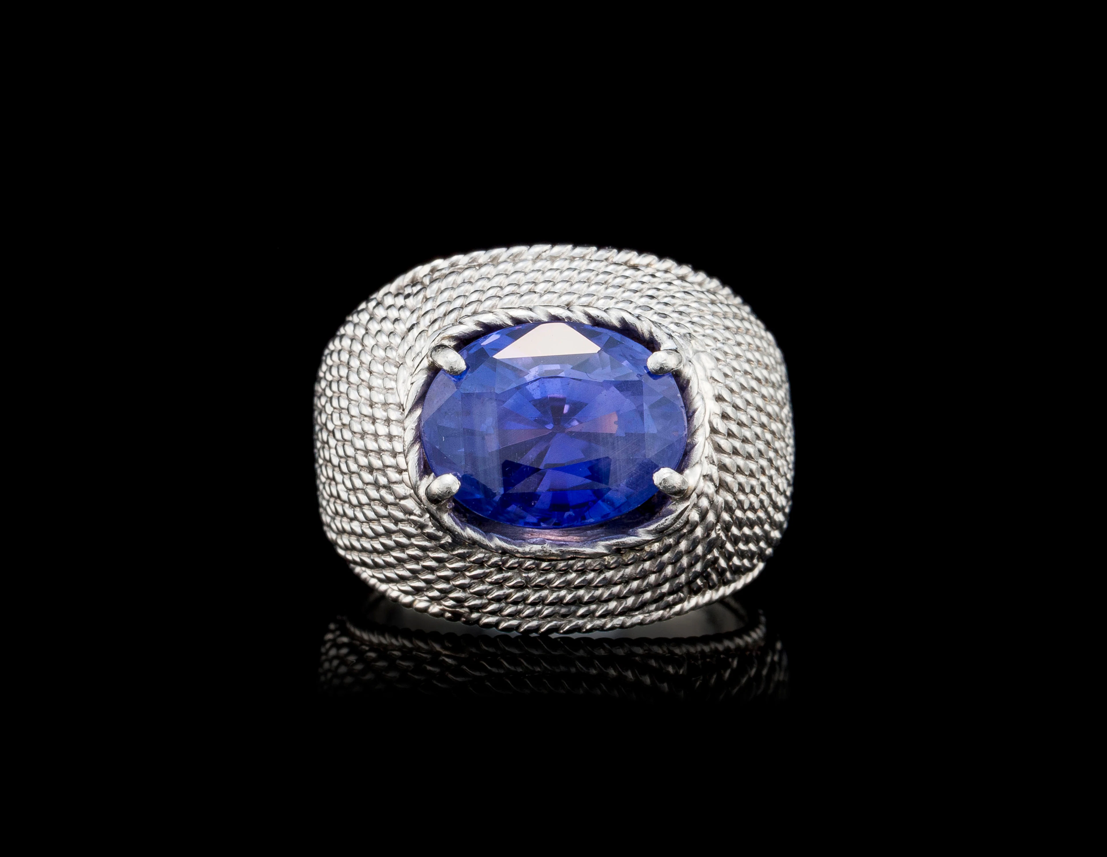 Sterlé, bague or gris 750 formée d'une multitude de fils torsadés