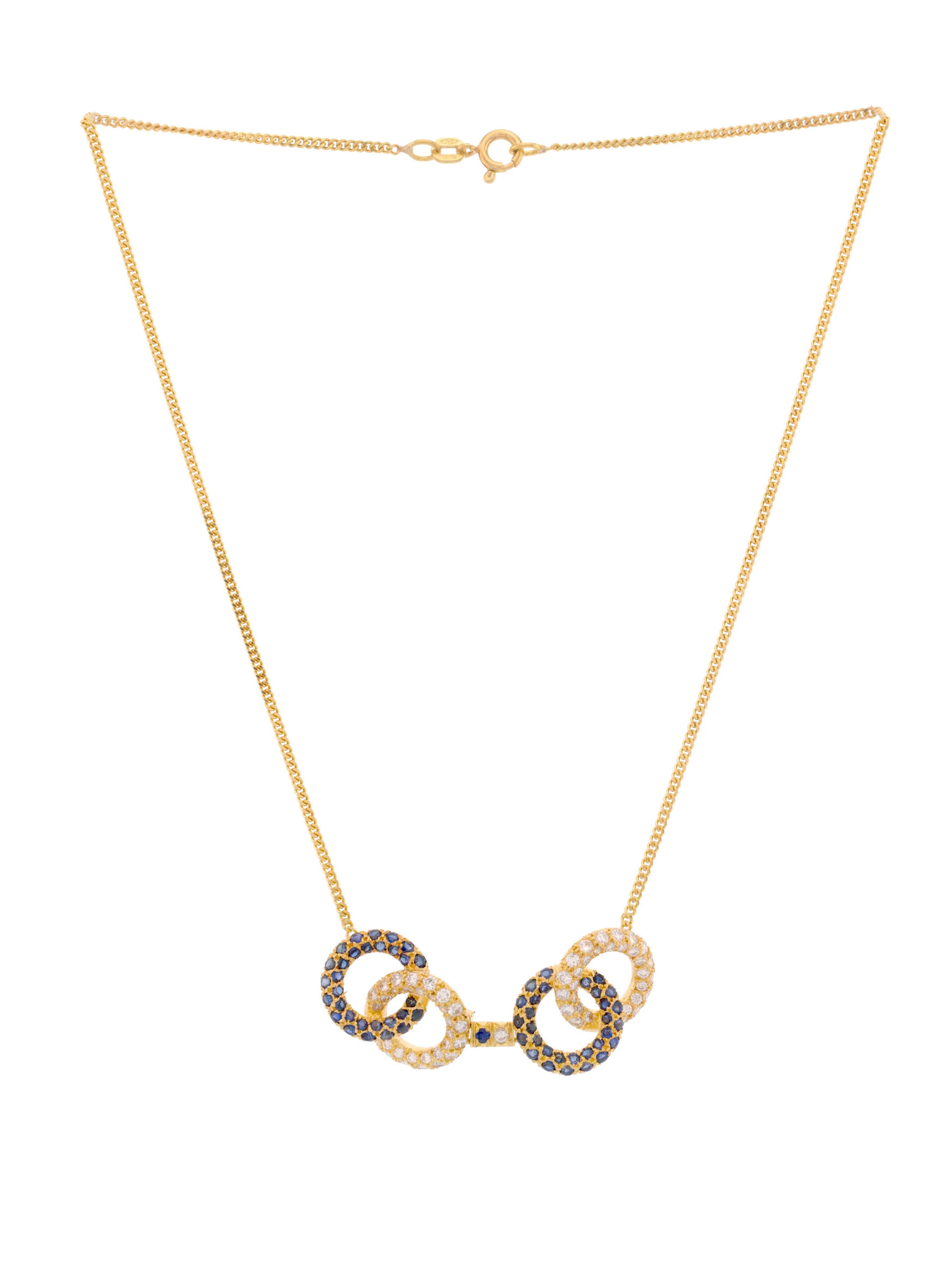 Collier or 750 à maille gourmette limée retenant un centre composé