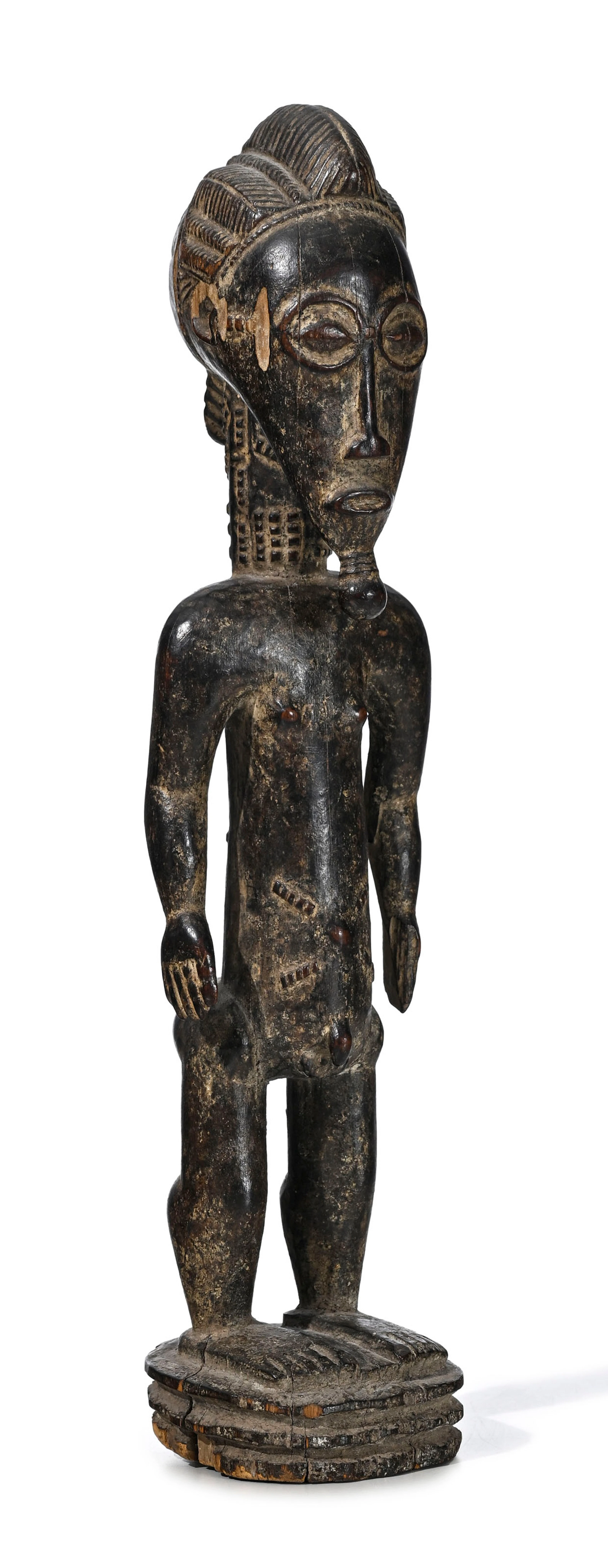 Statuette masculine Baoulé, bois à patine brun foncé et partiellement