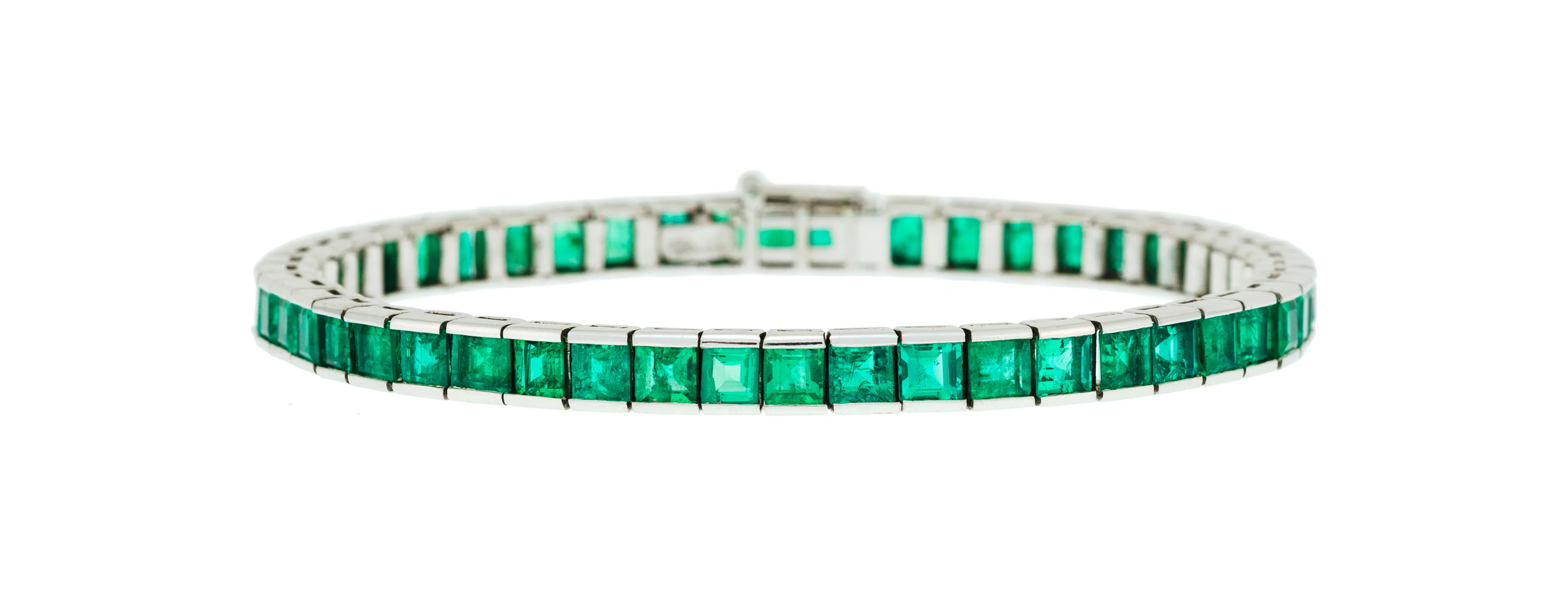 Gübelin, bracelet Art Déco or gris 750 à maillons carrés sertis d'émeraudes